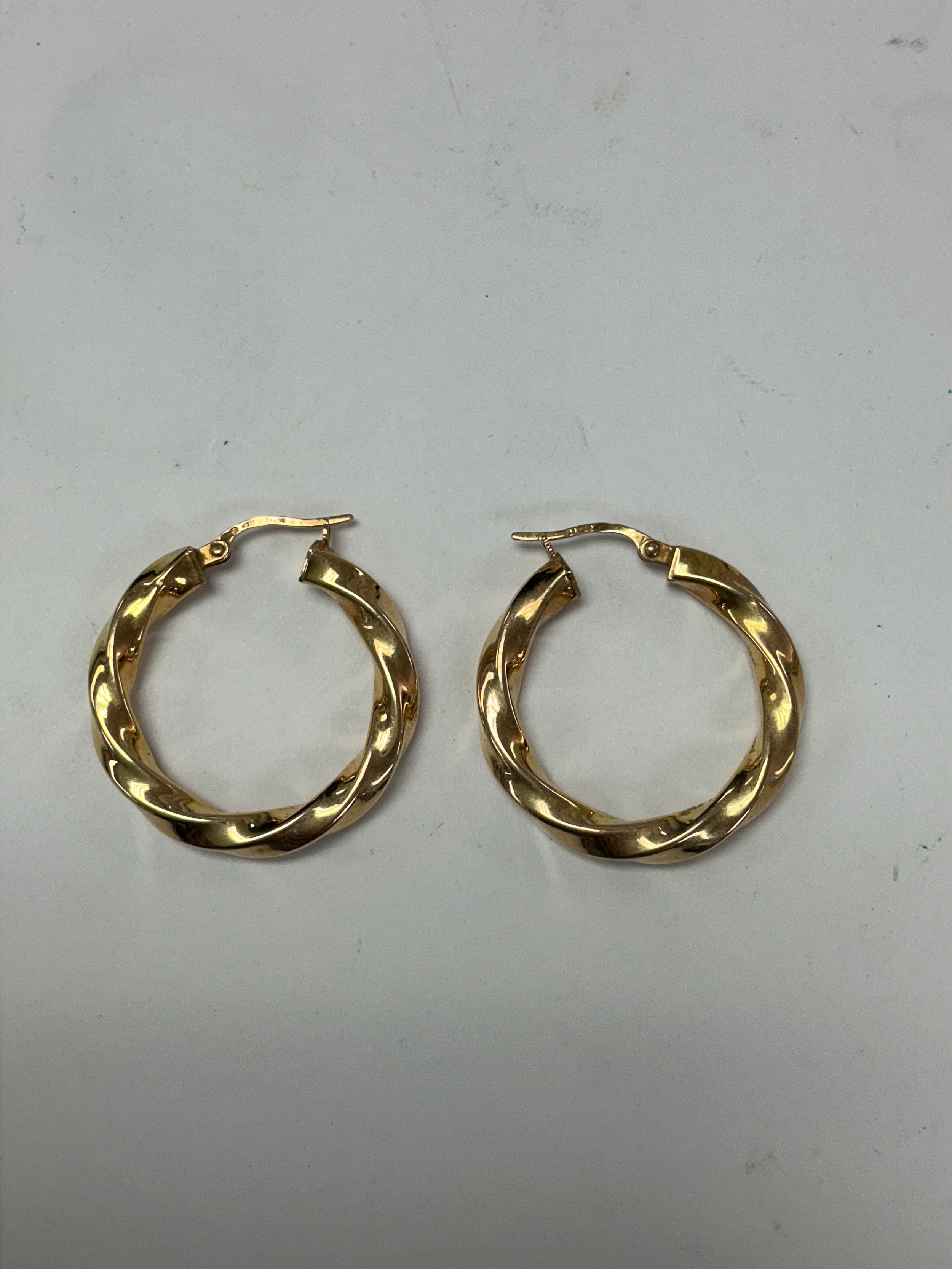 A pair of 9ct gold, hollow hoop earrings 2.87g