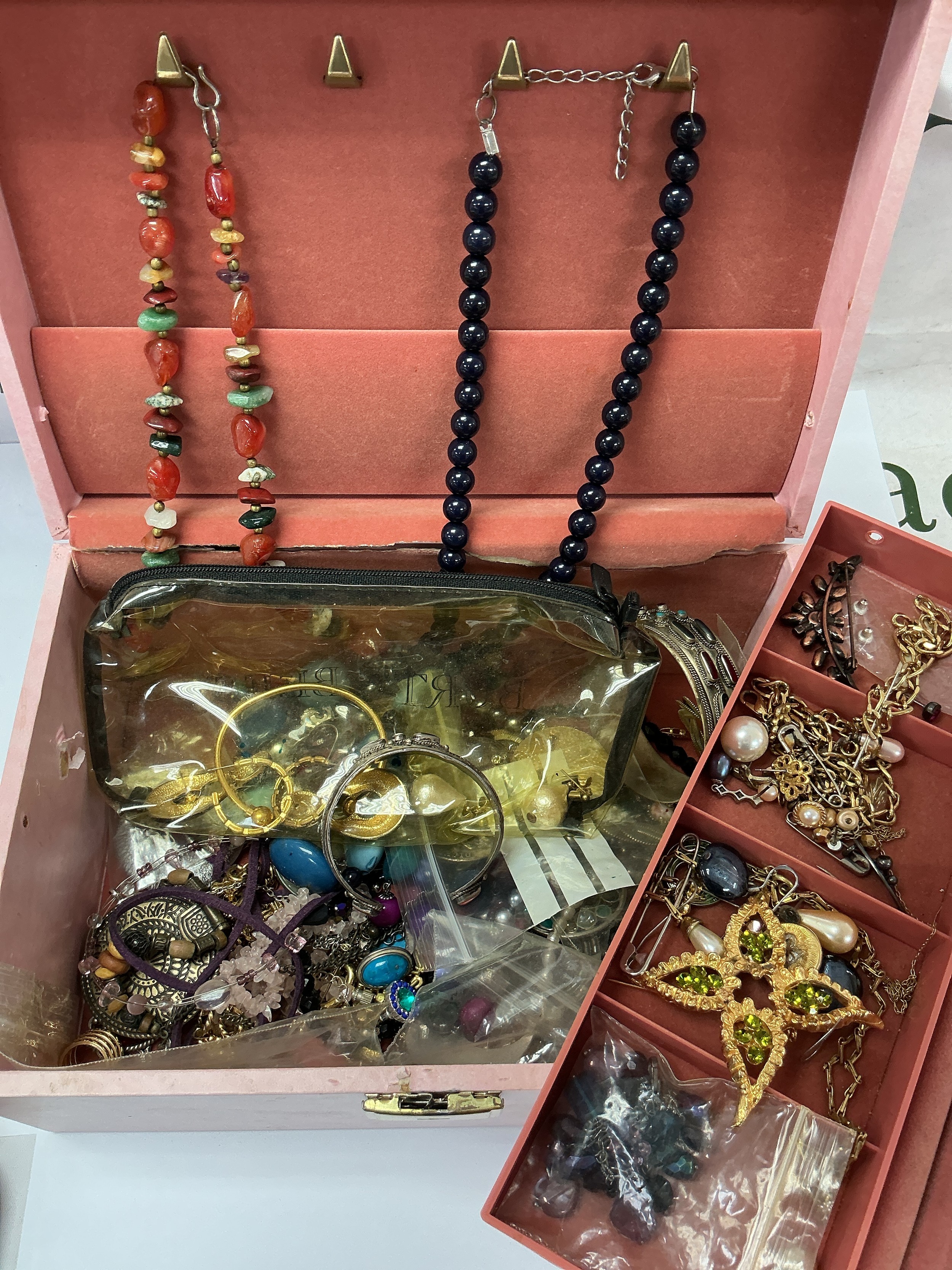 A box of assorted costume jewellery 