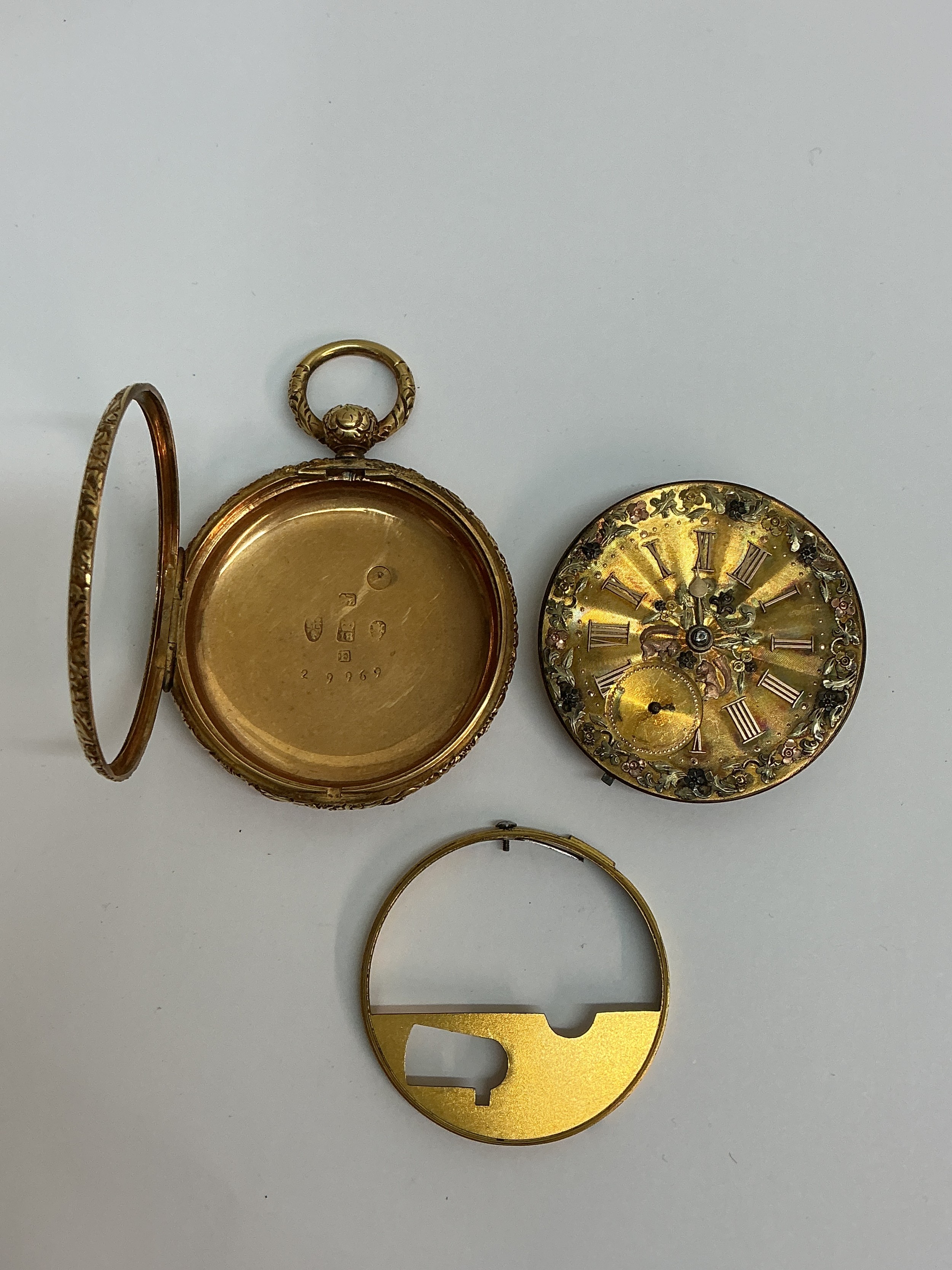 An 18ct gold, hallmarked pocket watch by Johnson of Liverpool, having elaborately decorated dial and turned case. Approx 4.5cm.Offered for restoration. 81.6g