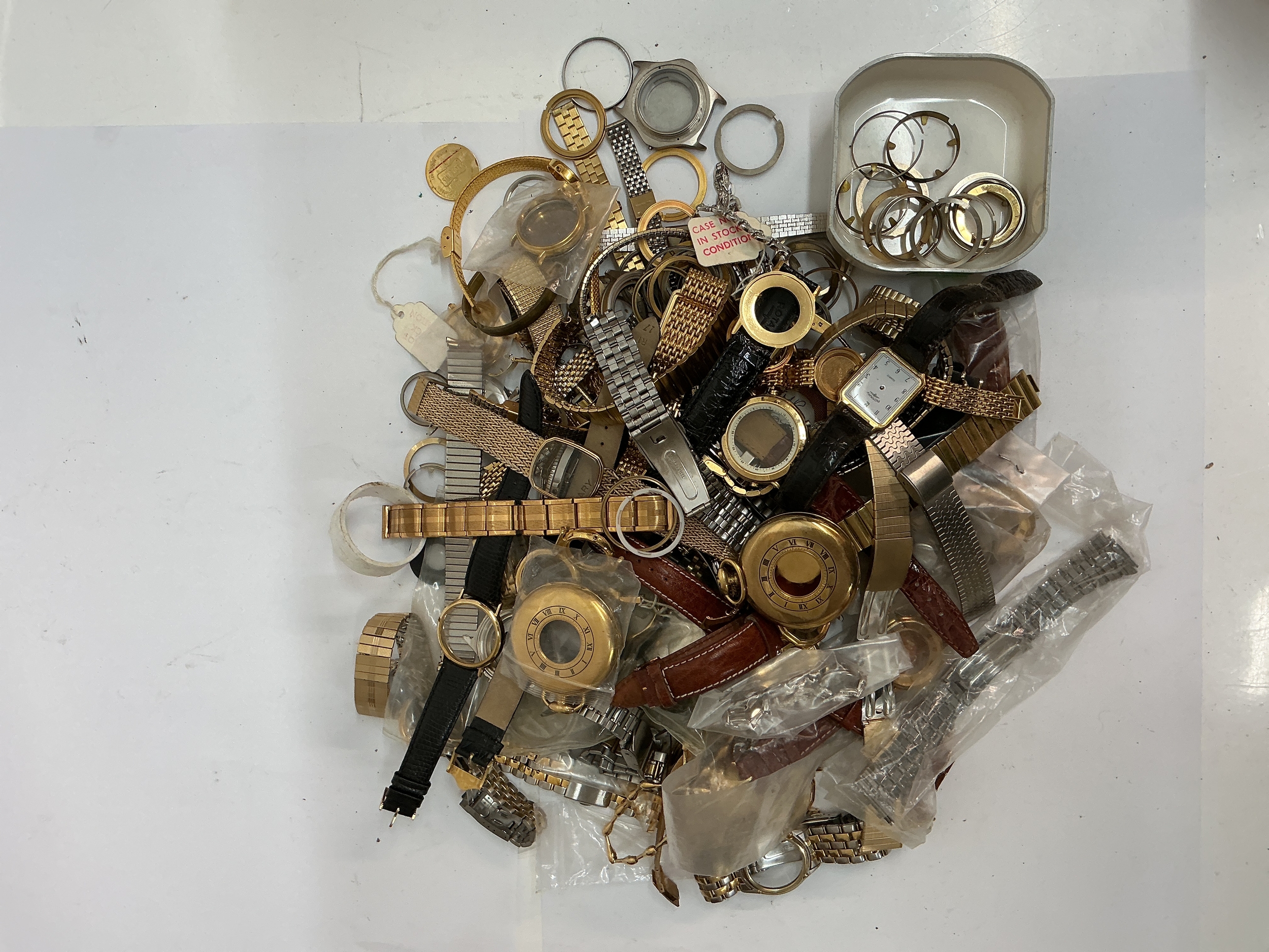 A quantity of assorted watch straps and parts including gold tone pocket watches and Rotary examples. Offered as spares or repairs