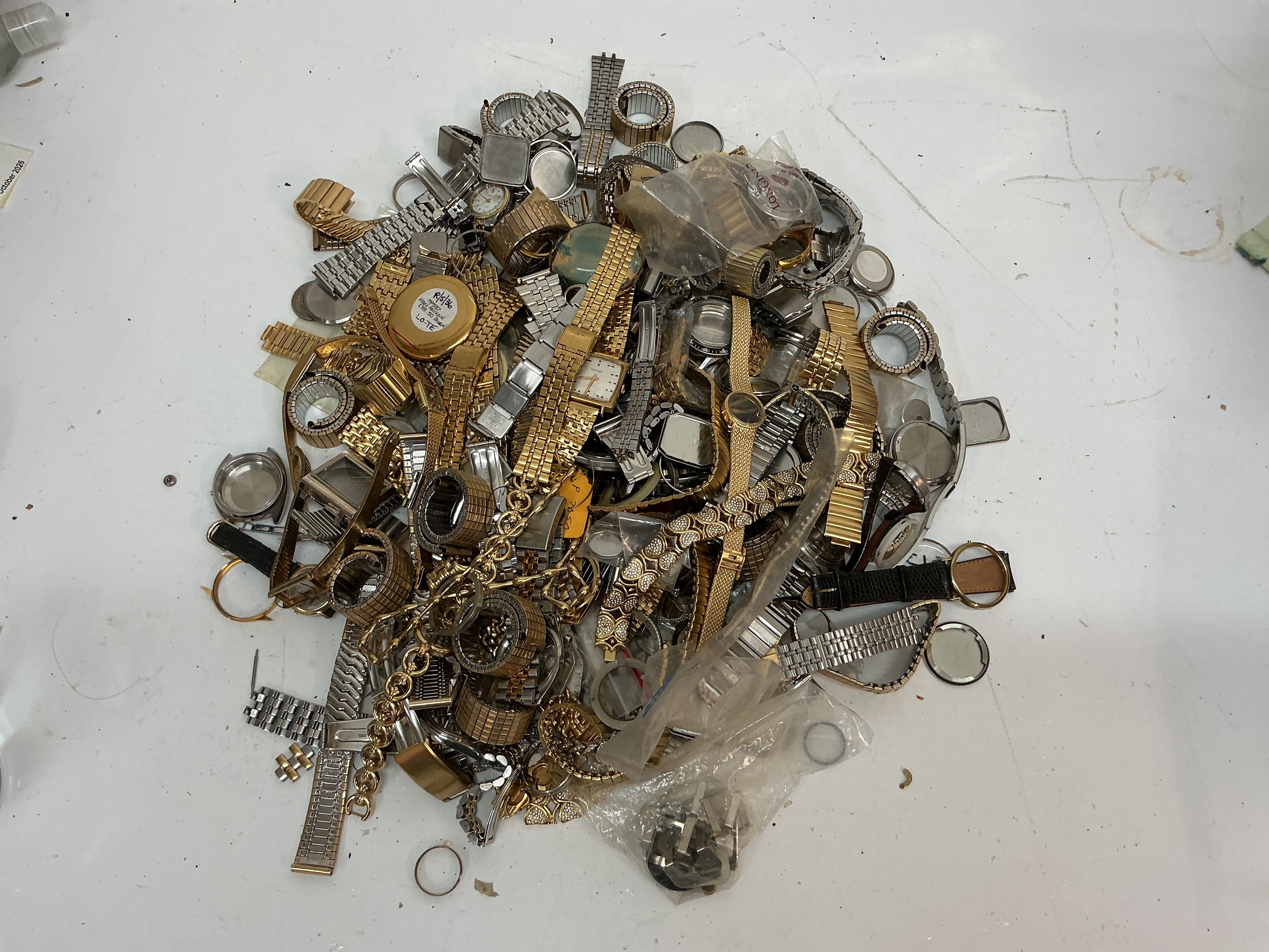 A quantity of bracelet watch straps and cases
