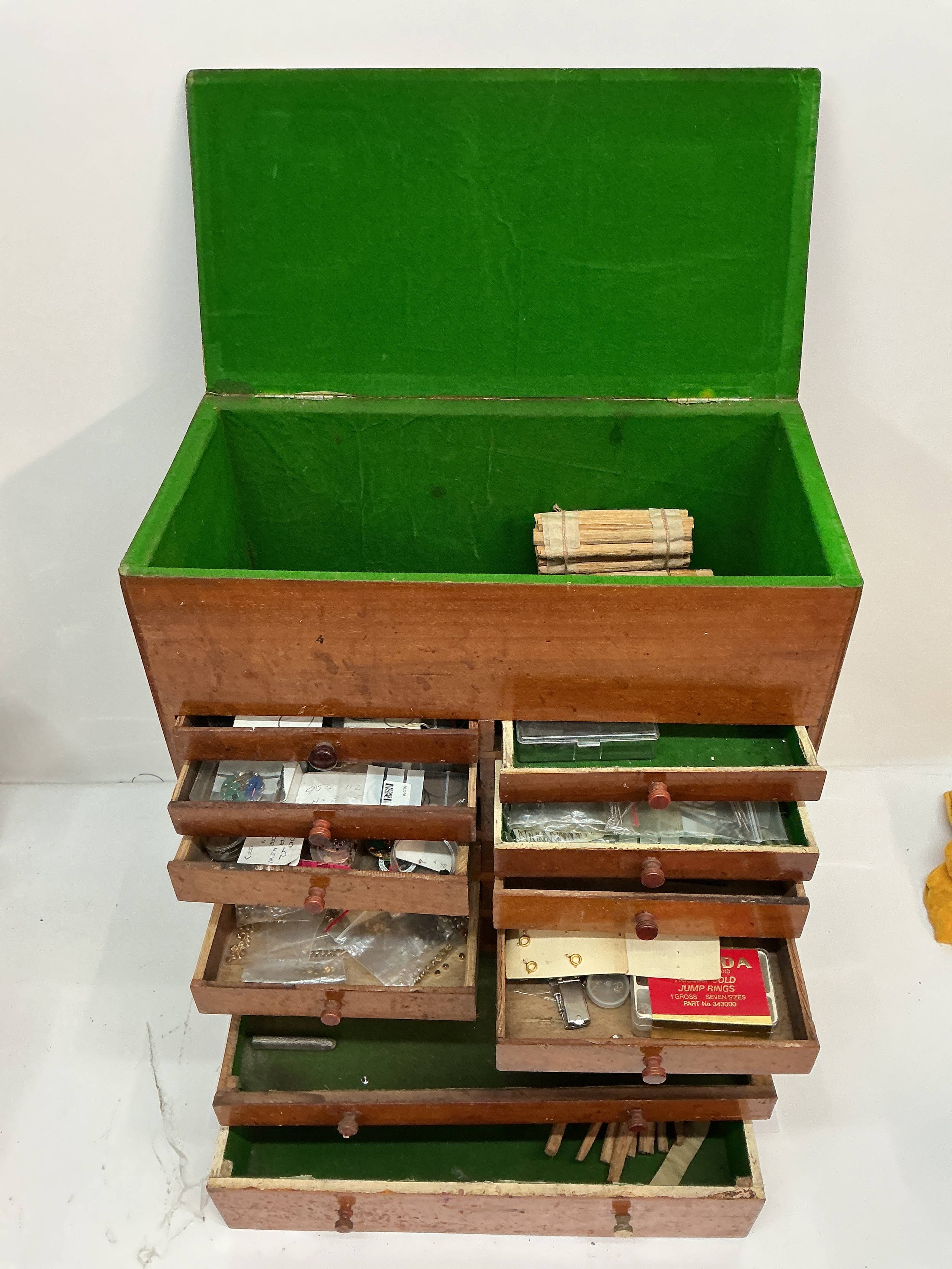 A further watch maker's cabinet drawer set including some assorted contents. Approx 19 x47cm