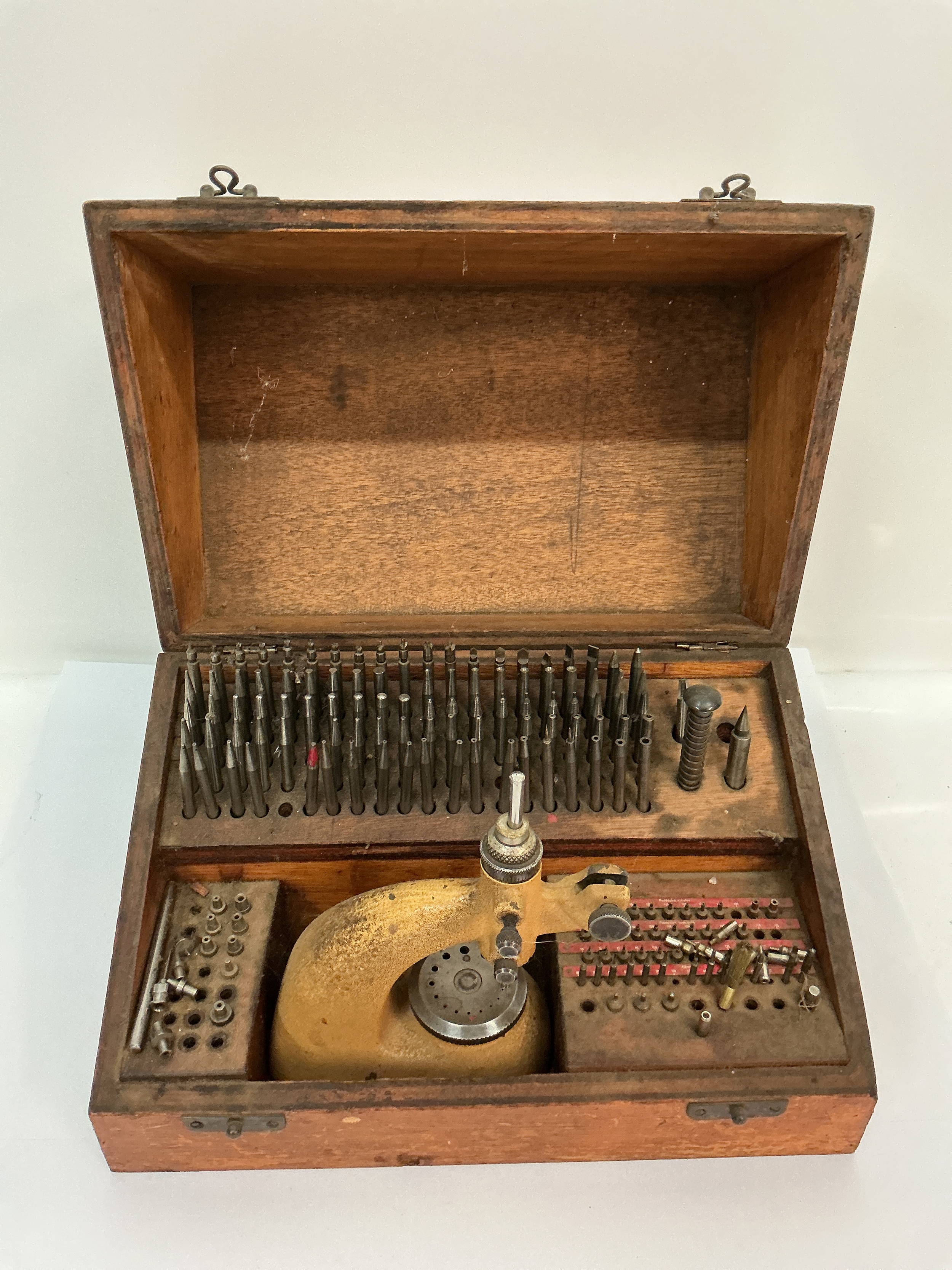 A watchmaker's antique staking kit. Approx: 17 x 27cm