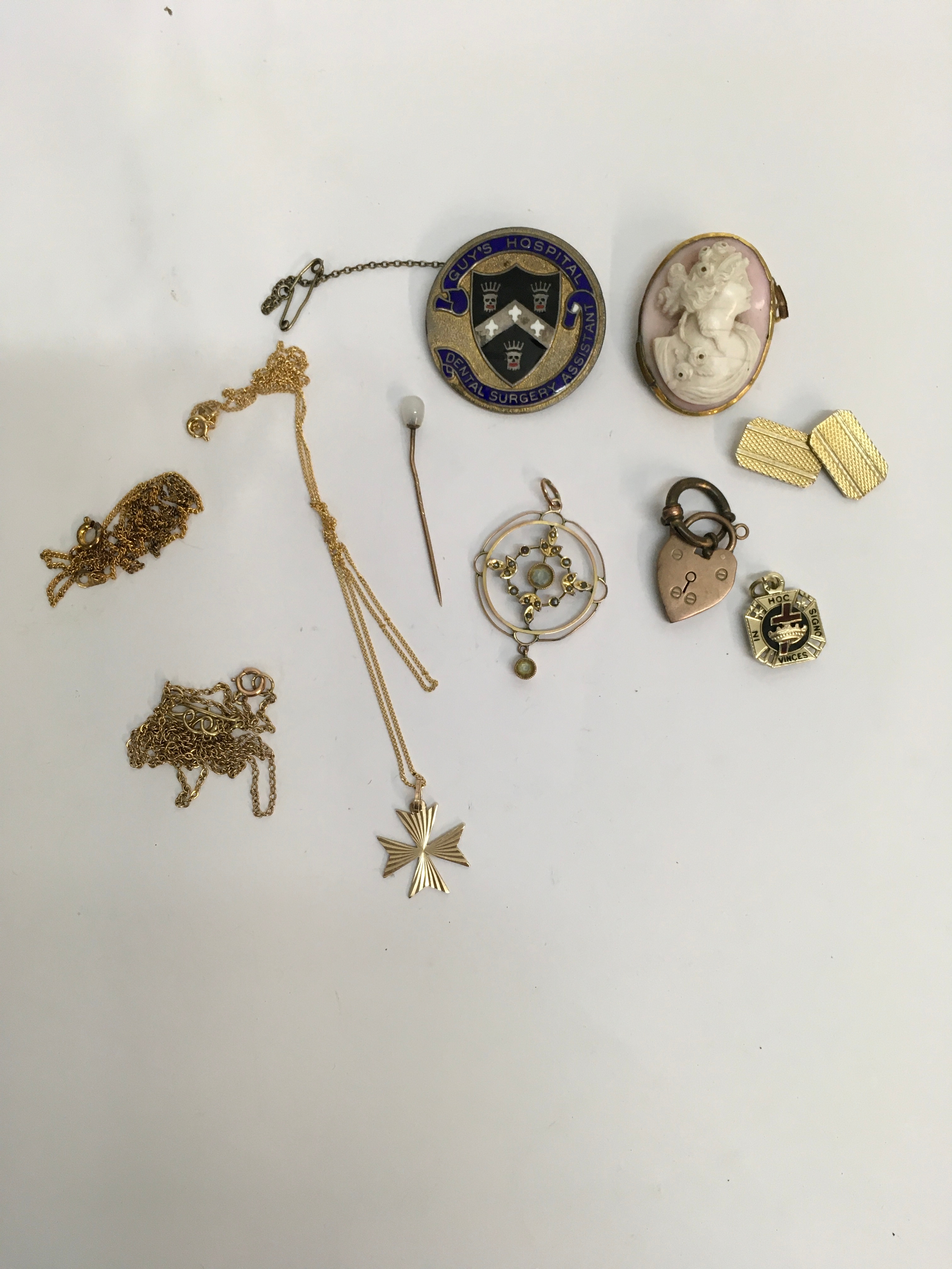 A 9ct gold Maltese Cross on chain, unmarked gold Edwardian pendant, heart padlock stamped 9ct, cameo brooch, silver gilt and enamel Dental Surgery brooch plus other odds.Approx collective total weight: 1.8g