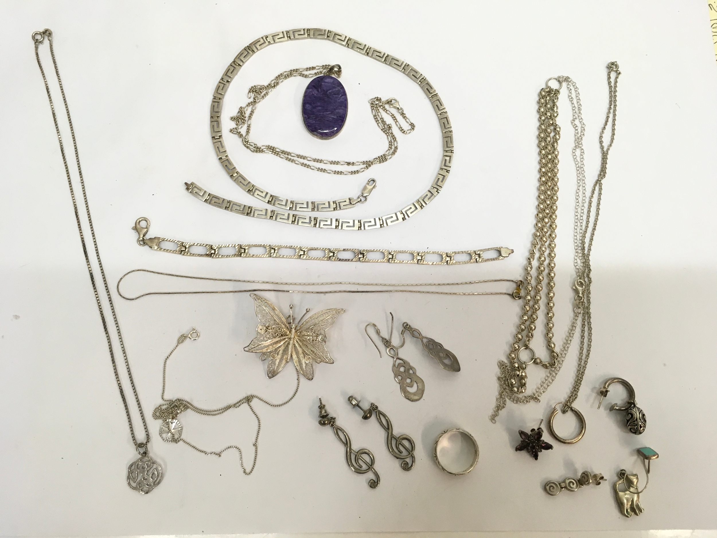 A group of 925 silver and white metal jewellery including a Greek key and pendant necklace. Approx collective weight 95g