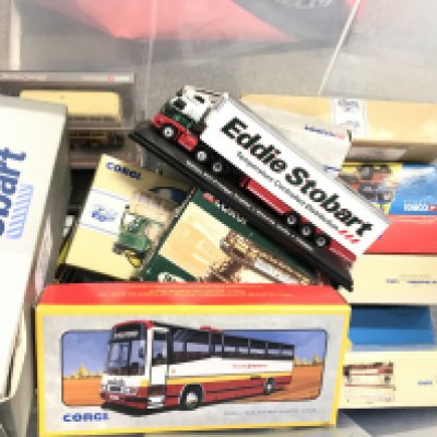 A Box Containing A Collection Of Atlas And Corgi Buses. Trams Etc. No Reserve.