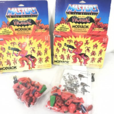 2 Boxed Vintage Masters Of The Universe Modulk Figures. Gun And Arm Missing From 1. Boxes Are Worn. No Reserve.