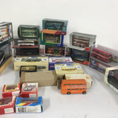 A collection in excess of 20 boxed model diecast vehicles mainly .busesâ€¦.coaches. No reserve 