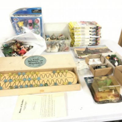 A collection of assorted toys some vintage including boxed The House of Marbles..7 boxes of soldiers by Action..a unopened Thunderbirds figure set..plus other items.  No reserve