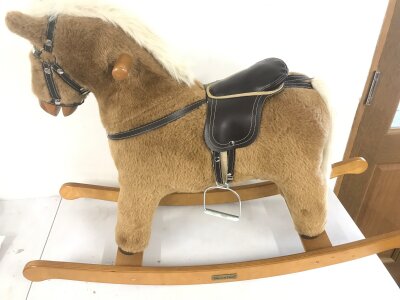 A mamas and papas rocking horse. 
94cm long 67cm highest point.