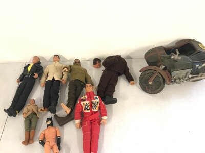 Collective lot of action figures including action man.