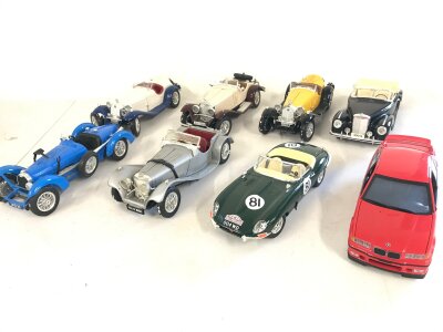 8 x 1:18 scale die cast cars including Jaguar  BMW etc.