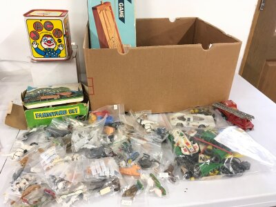 A mixed collection includes Britains figures, Fairylite farmyard set, Mattel tin plate musical jack in the box plus others.  No reserve