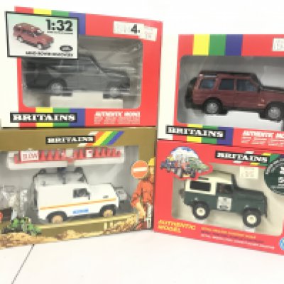 4 Boxed Britains Land Rovers Including 2 X Land Rover Discoverys. A Police Land Rover and A National Trust Land Rover. (4).