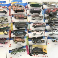 A Box Containing Hotwheels And Matchbox Diecast.