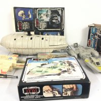 A collection of boxed and loose Vintage Star Wars items including a boxed Snowspeeder and Tauntaun.