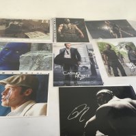 A collection of 8 signed TV and Film stars including Daniel Craig..Brad Pitt..Tom Hardy..Jennifer Lawrence Al Pacino and others.  Some with COA.