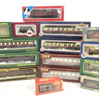 A Collection of Boxed 00 Gauge Coaches And Wagons. Various Makes. No Reserve.