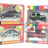 4 Boxed Britains Land Rovers. 2 Freelanders #s09484 And 09483. A Forest Enterprise Land Rover #5986 And A Discovery Rally #9482. (4).