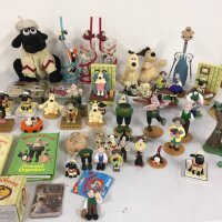 A large varied collection of Wallace and Gromit merchandise including display figures, personal organisers, bottle cork remover plus other items.  No reserve