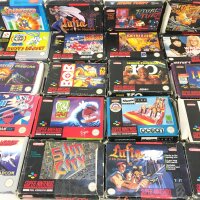 A Collection Of 20 Super Nintendo Games. Sim City. Wing Commander And Fortress Of Doom Have No Instuctions.