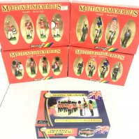 5 Boxed Britains Sets. Including U.S. Marine Drum And Bugle corp #7304. Scots Guards #7210. Royal Marines #7201. U.S. Colour Party #7306 And A Trooping The Colour Set #40117.(5).