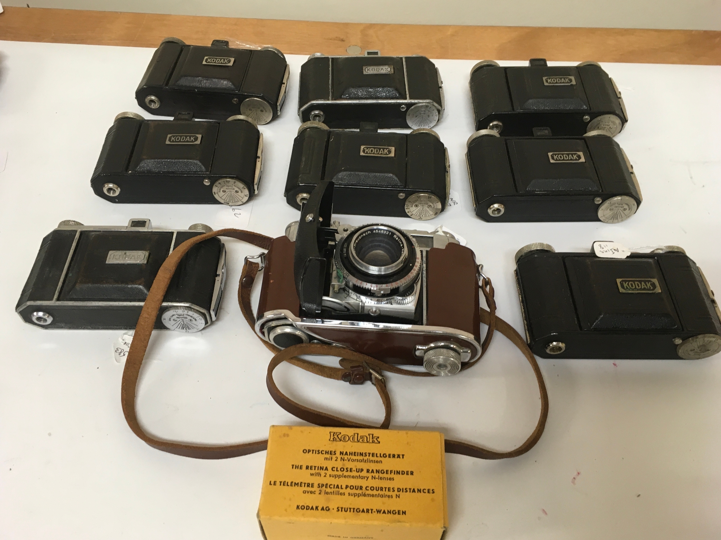 9 Kodak Compur/ Compur Synchro cameras. 1 includes holster with strap. 1 Retina close-up Rangefinder.
