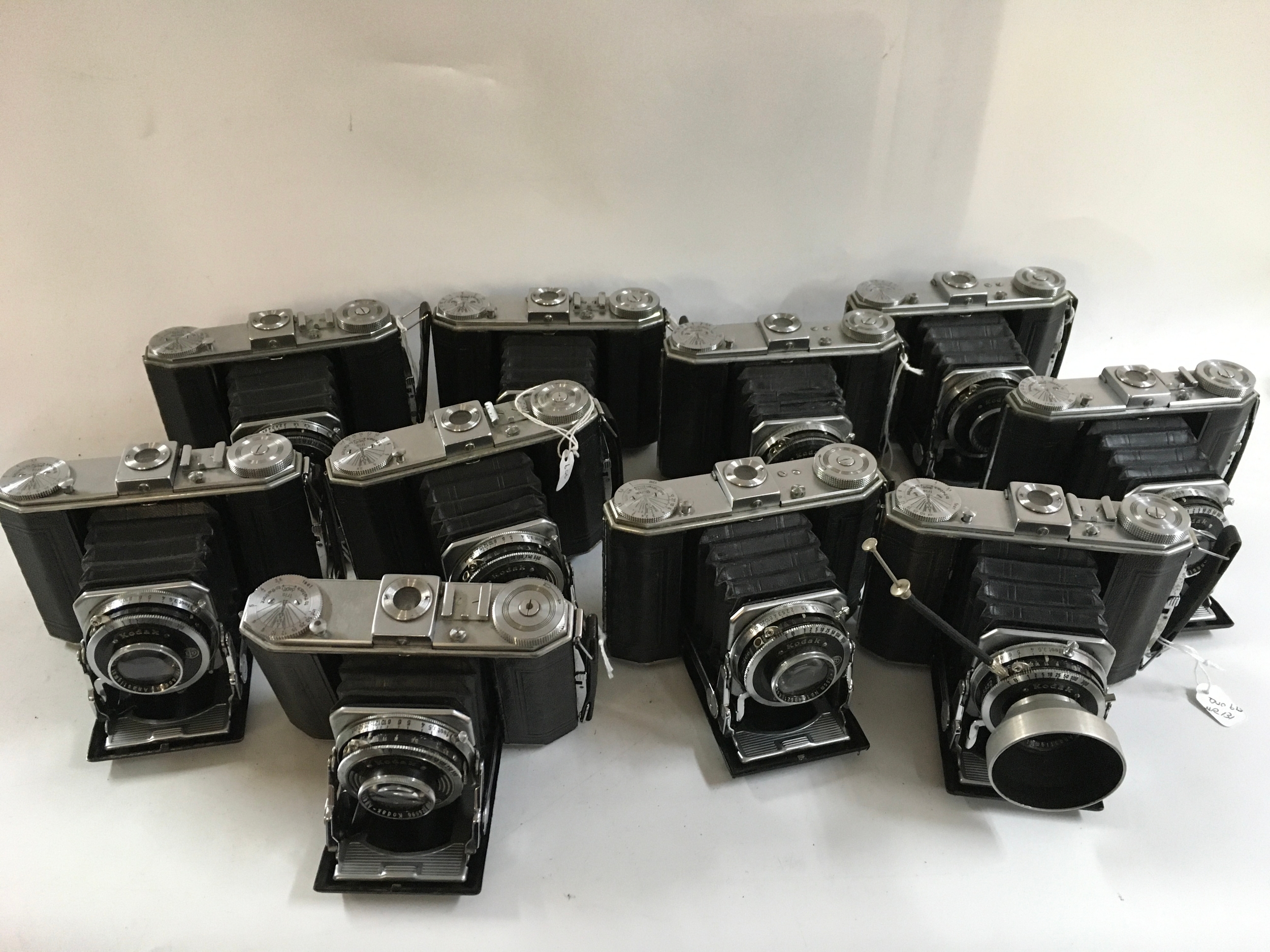 A collection of 10 identical Kodak cameras