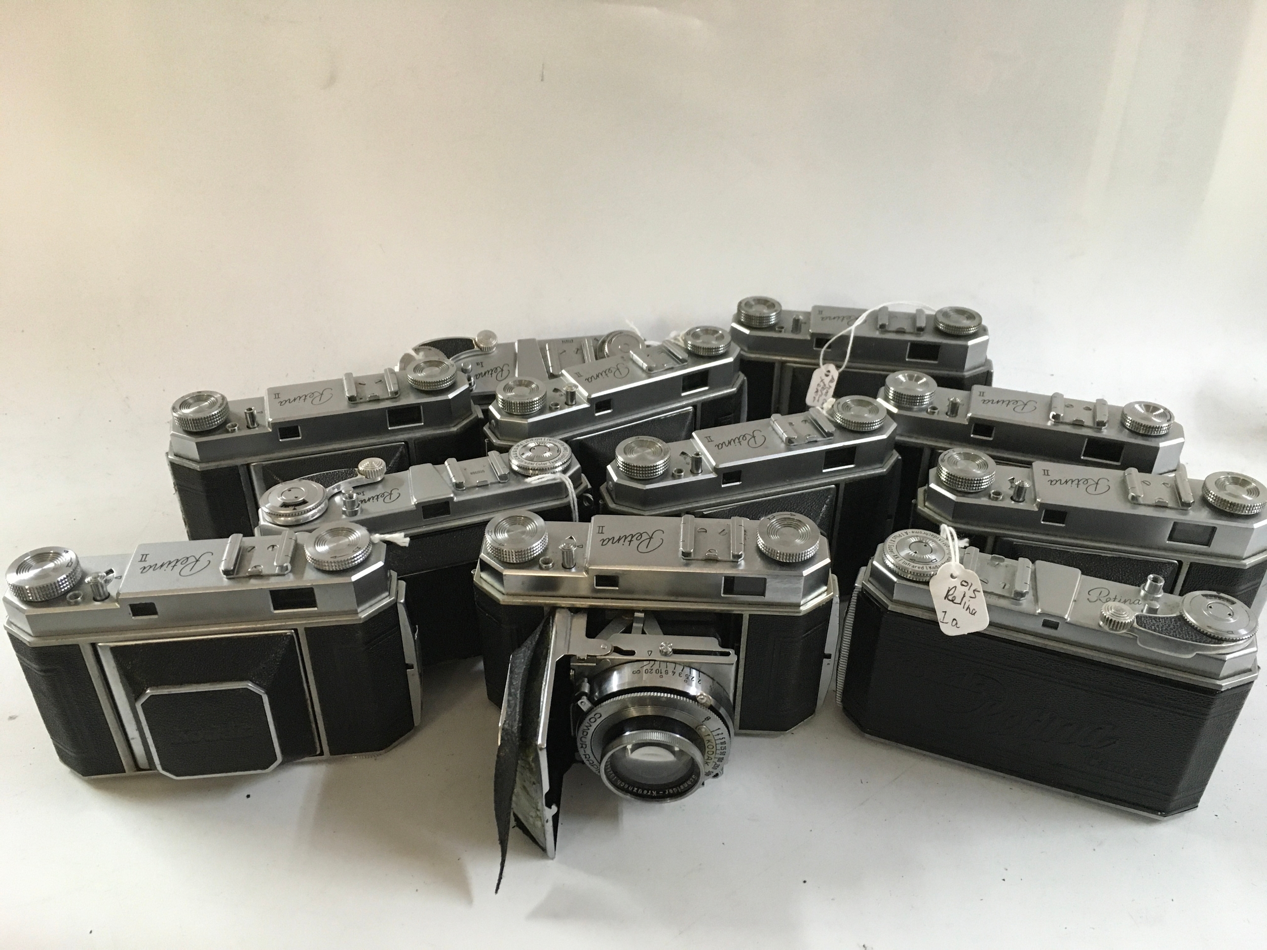 A collection of 11 Kodak Retina cameras and 3 Kodak duo 620 cameras. 