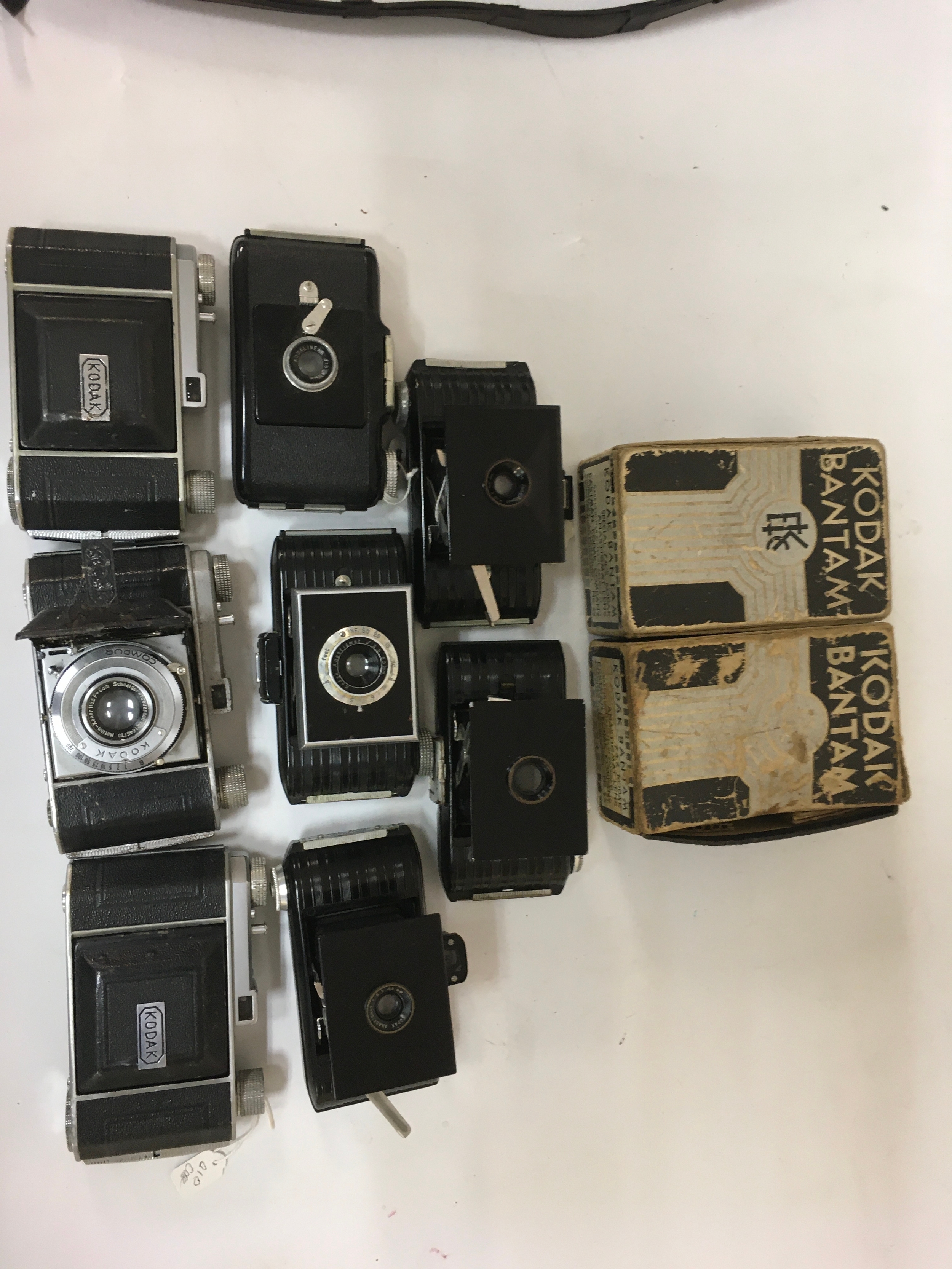 10 Kodak cameras x7 bantam of different variations including x2 box package.  X3 Kodak Compur.
