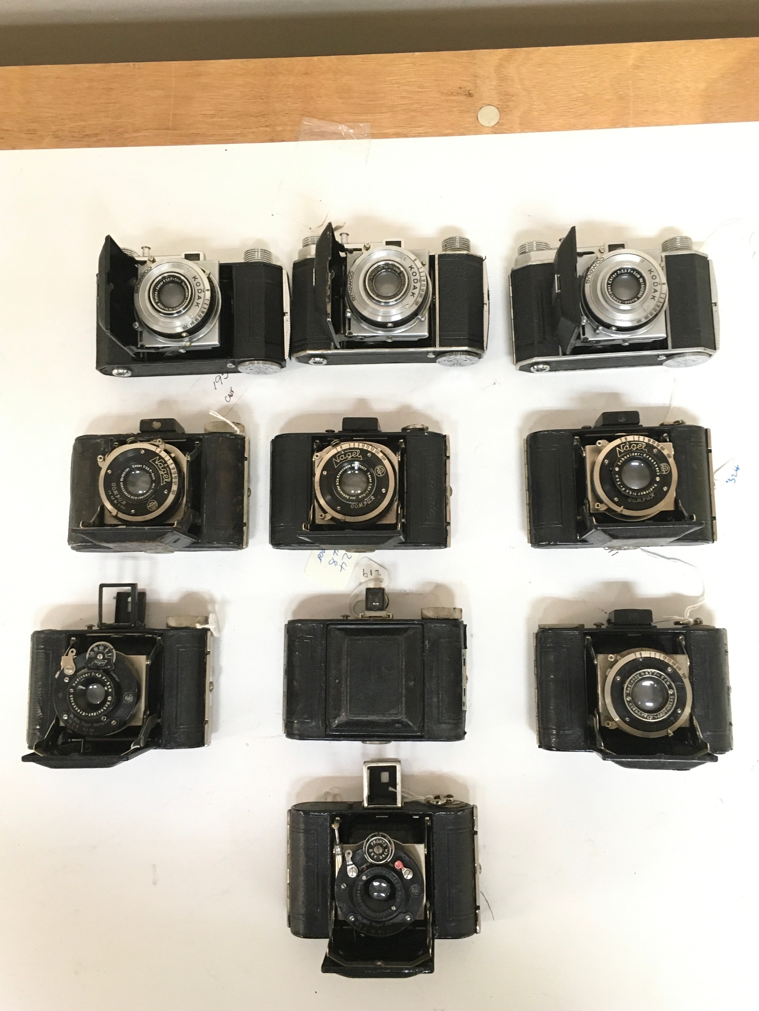 X10 Cameras. X3 kodak Compur. X7 Nagel / Pronto  with different variations of  camera lenses.