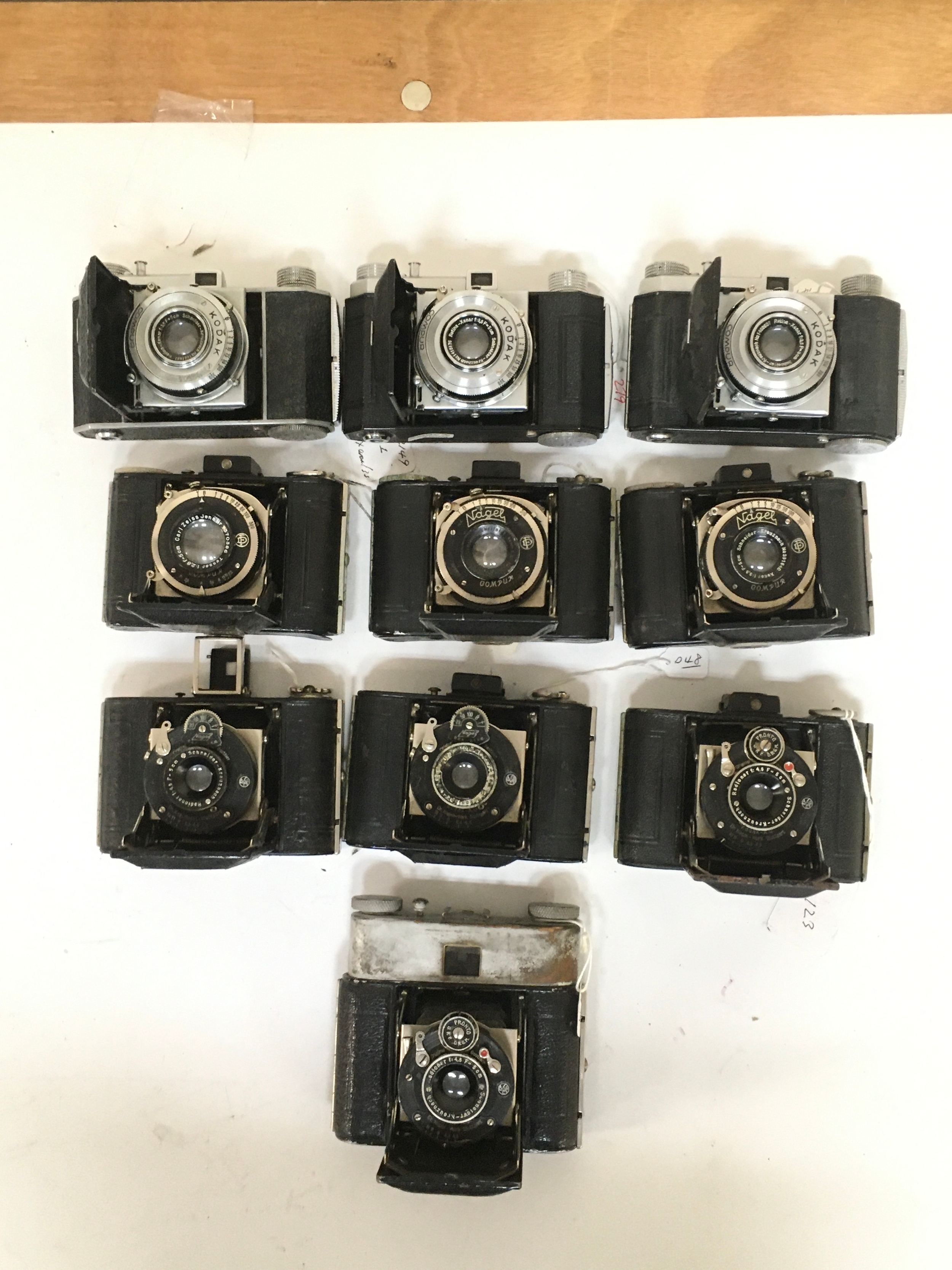 X10 assortment of Kodak Compur and Nagel / Nagel Pronto & Compur Cameras.