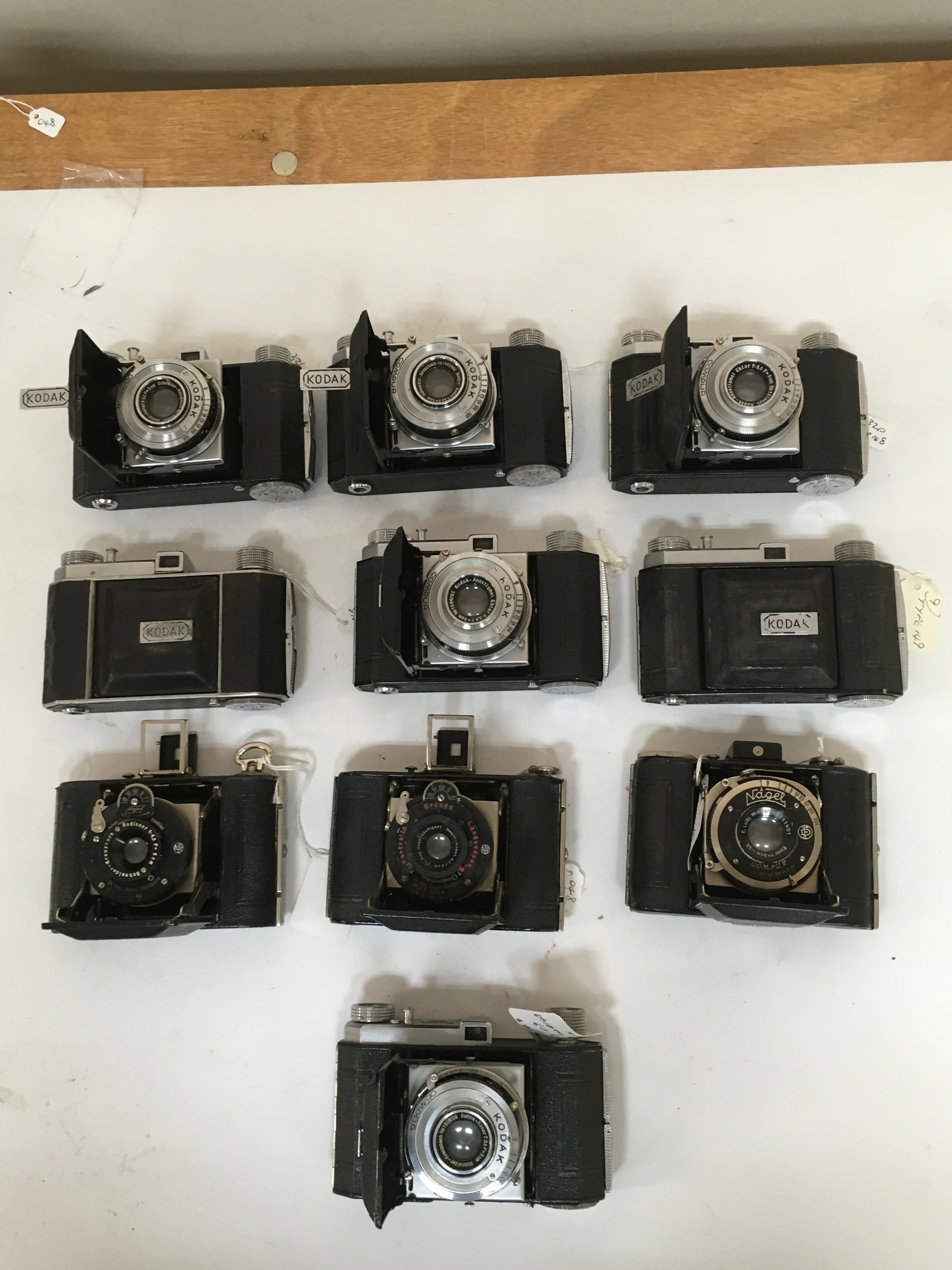 X10 assortment of cameras. Kodak Retina, Compur  and several Nagel variations.