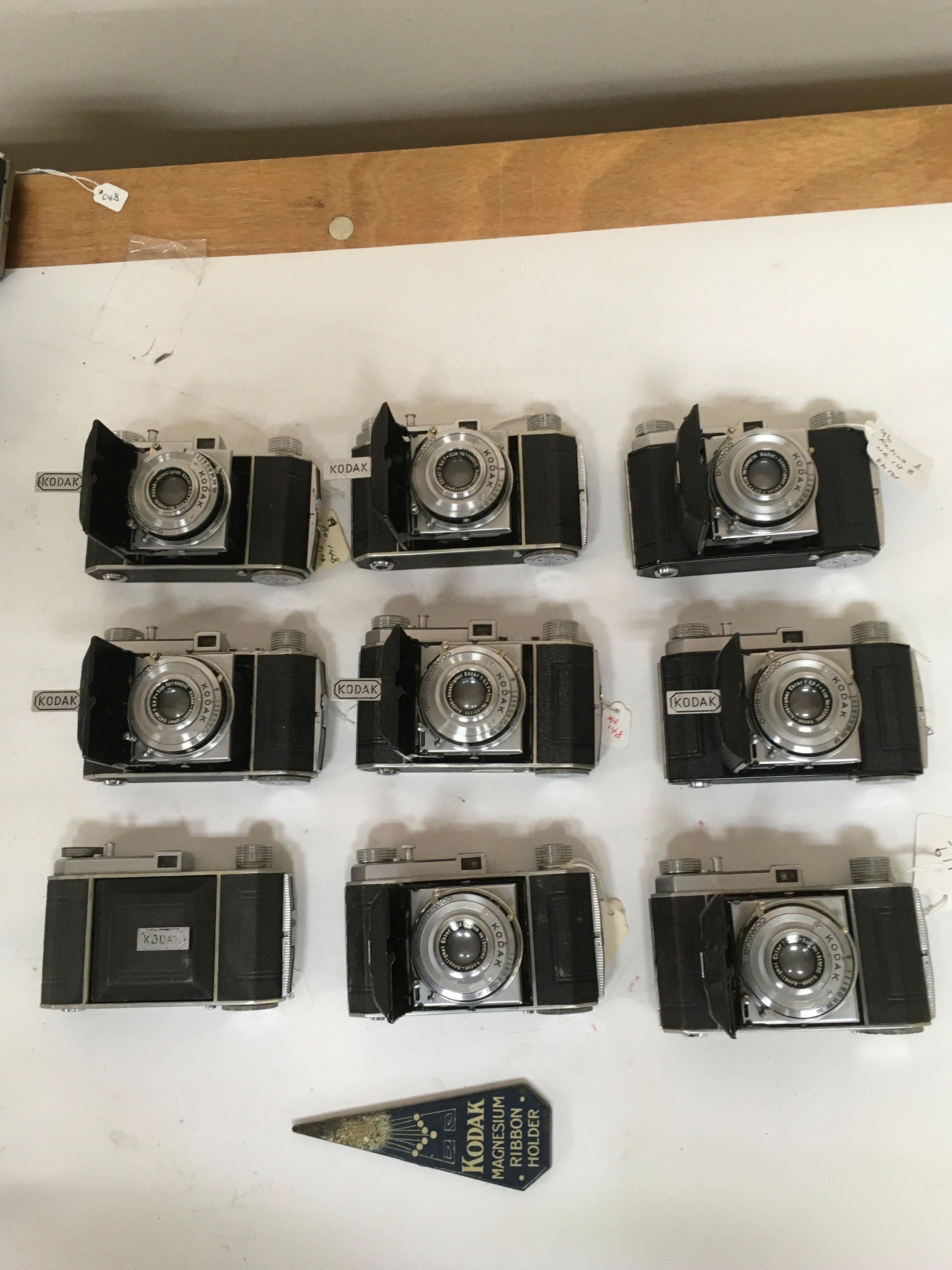 X9 Kodak Compur / Compur Rapid cameras. X1 Kodak magnesium Ribbon holder.