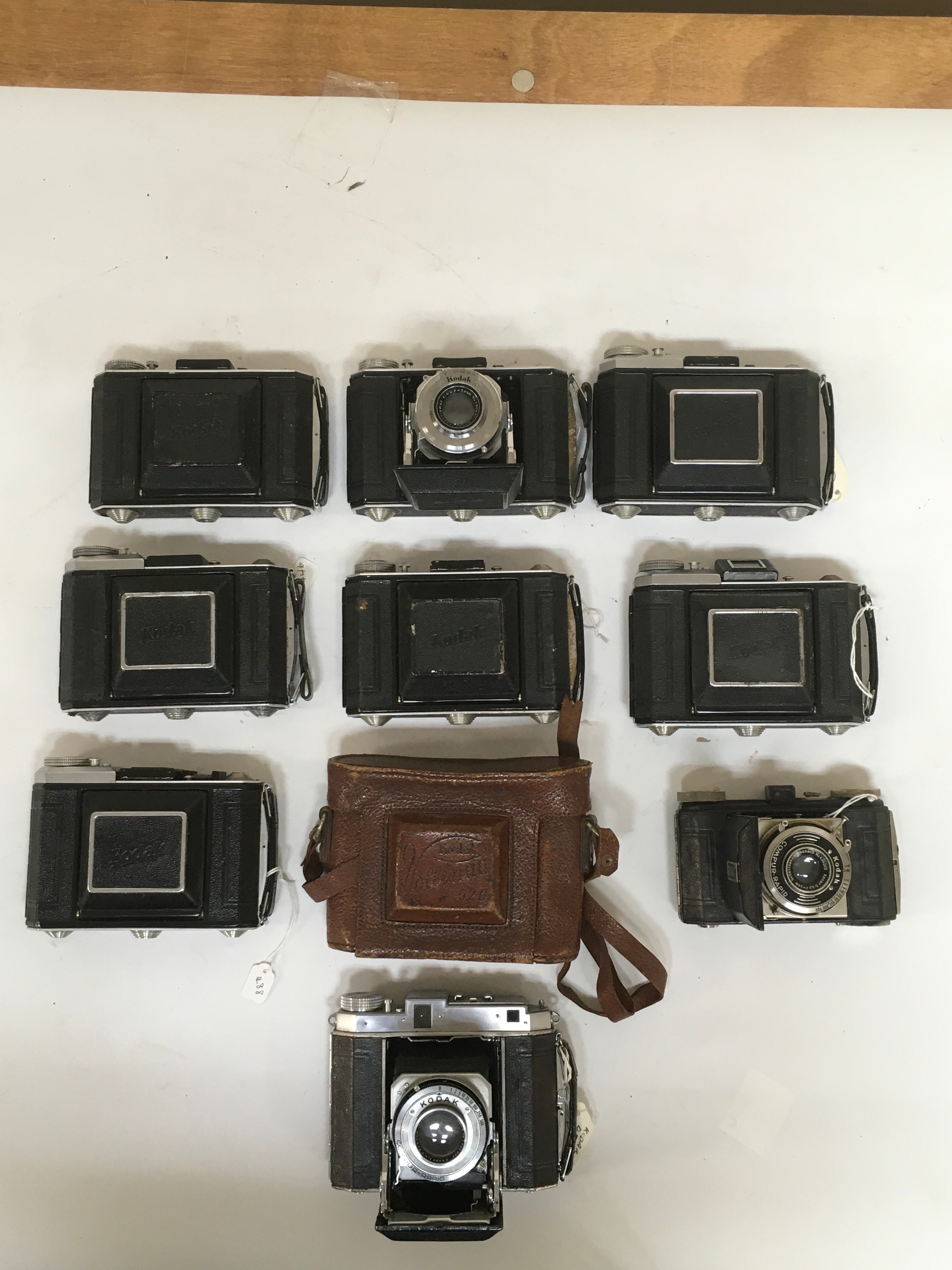 10 items 7 Vollenda 620 kodaks with 1 Vollenda 620 holster carrier. 2 variations of the Kodak Campur - Rapid cameras.