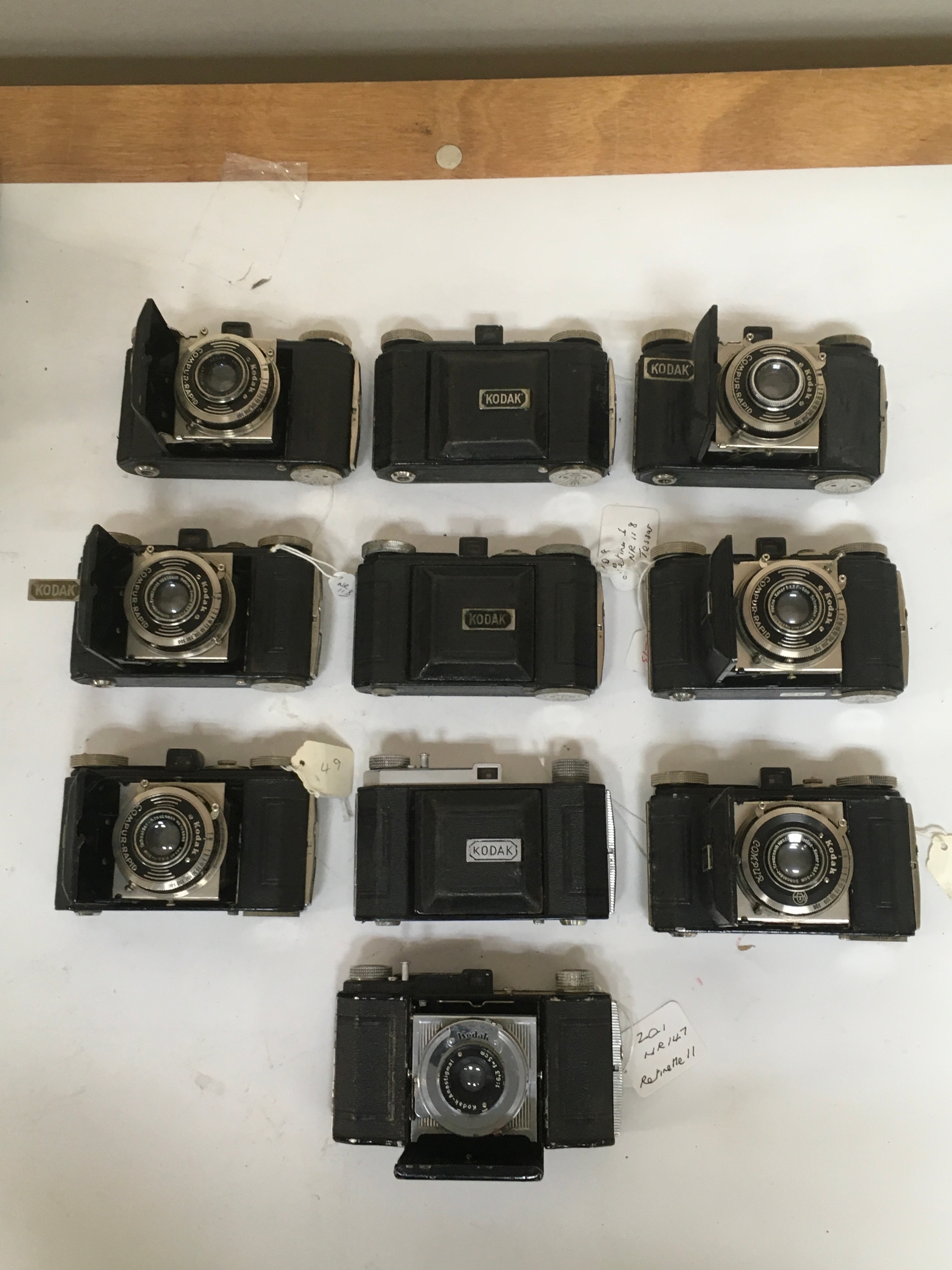 10 kodak Cameras. 9 Compur / Compur-Rapid. 1 Kodak-Anastigmat.