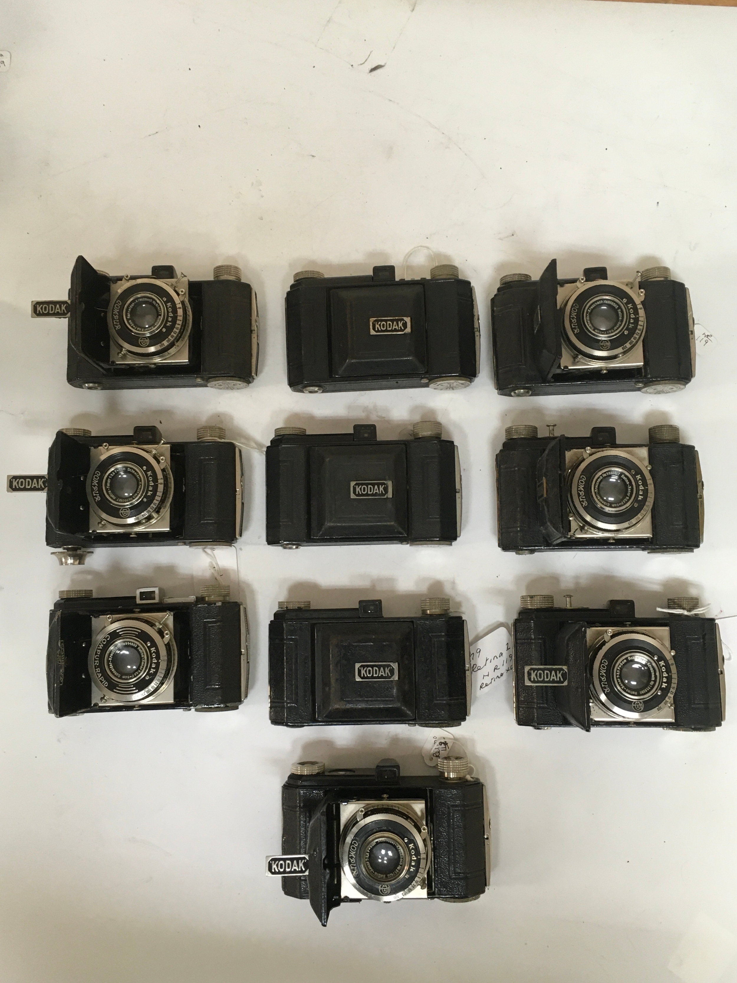 10 Kodak Compur/ Compur Rapid Cameras.