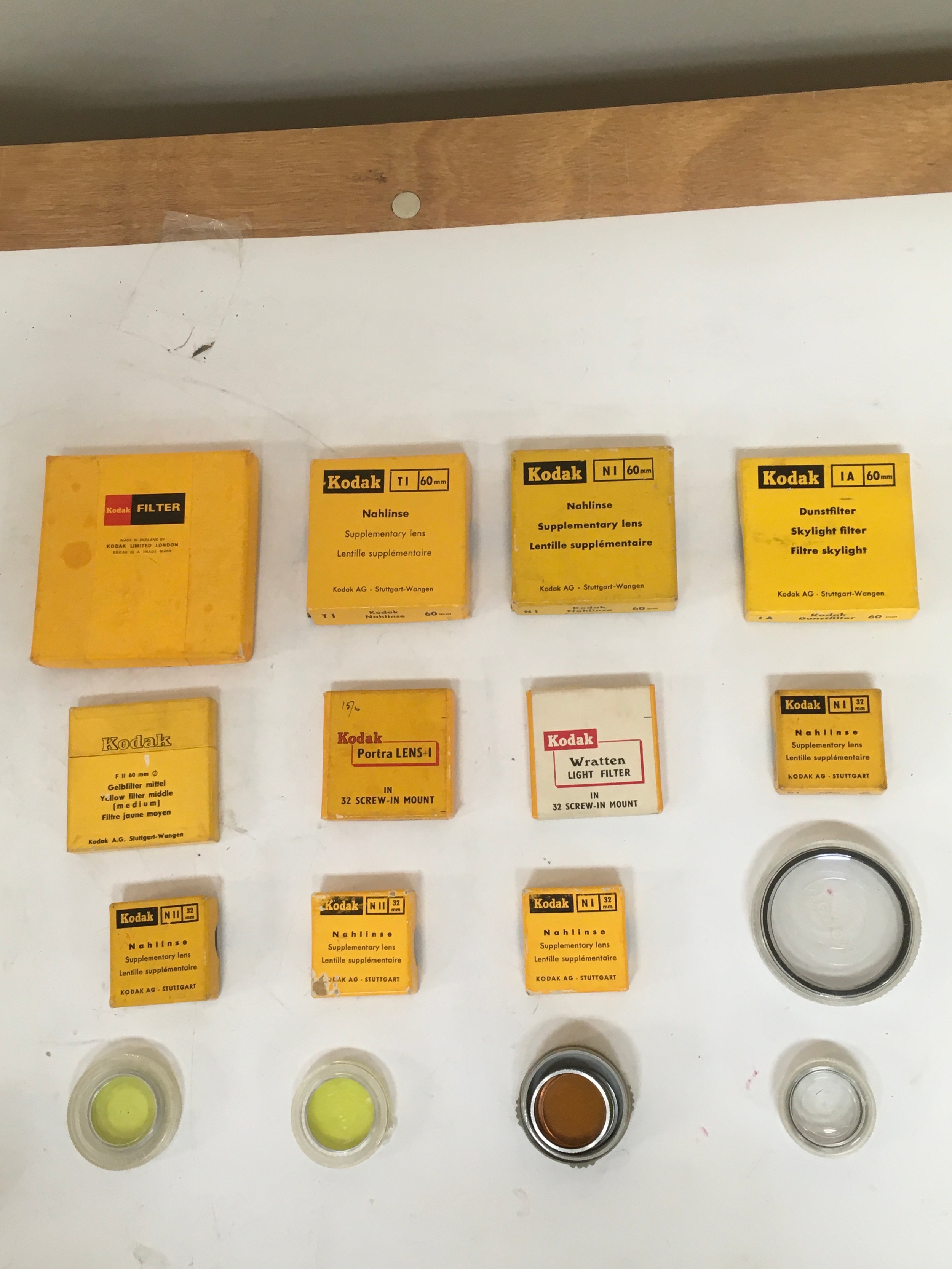 Assortment of  16 items. Kodak lenses Sky light filters, lenses and coloured lens filters and 2 screw in mounts.