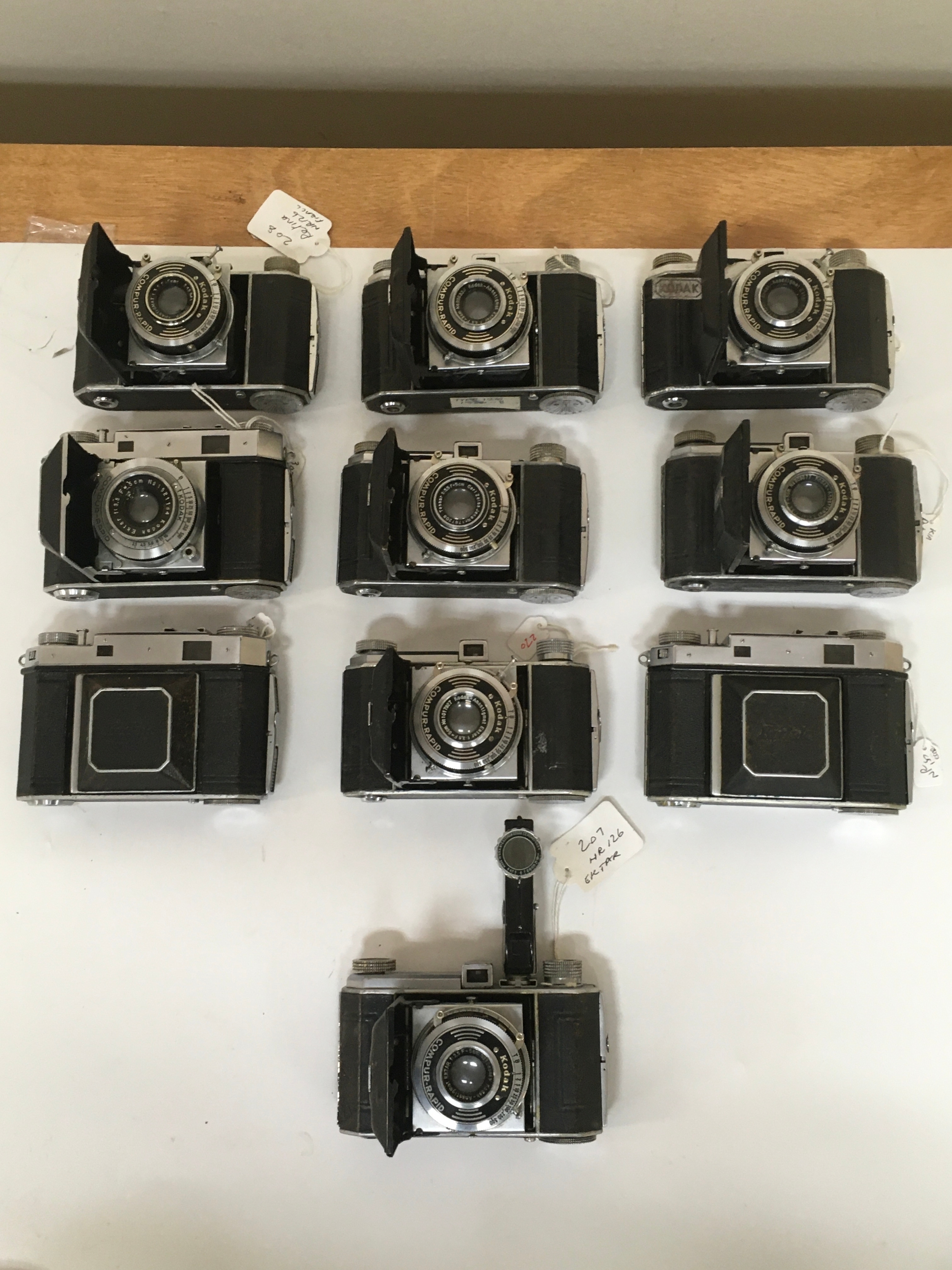10 Kodak  Compur Rapid Cameras 1 having an additional range finder.