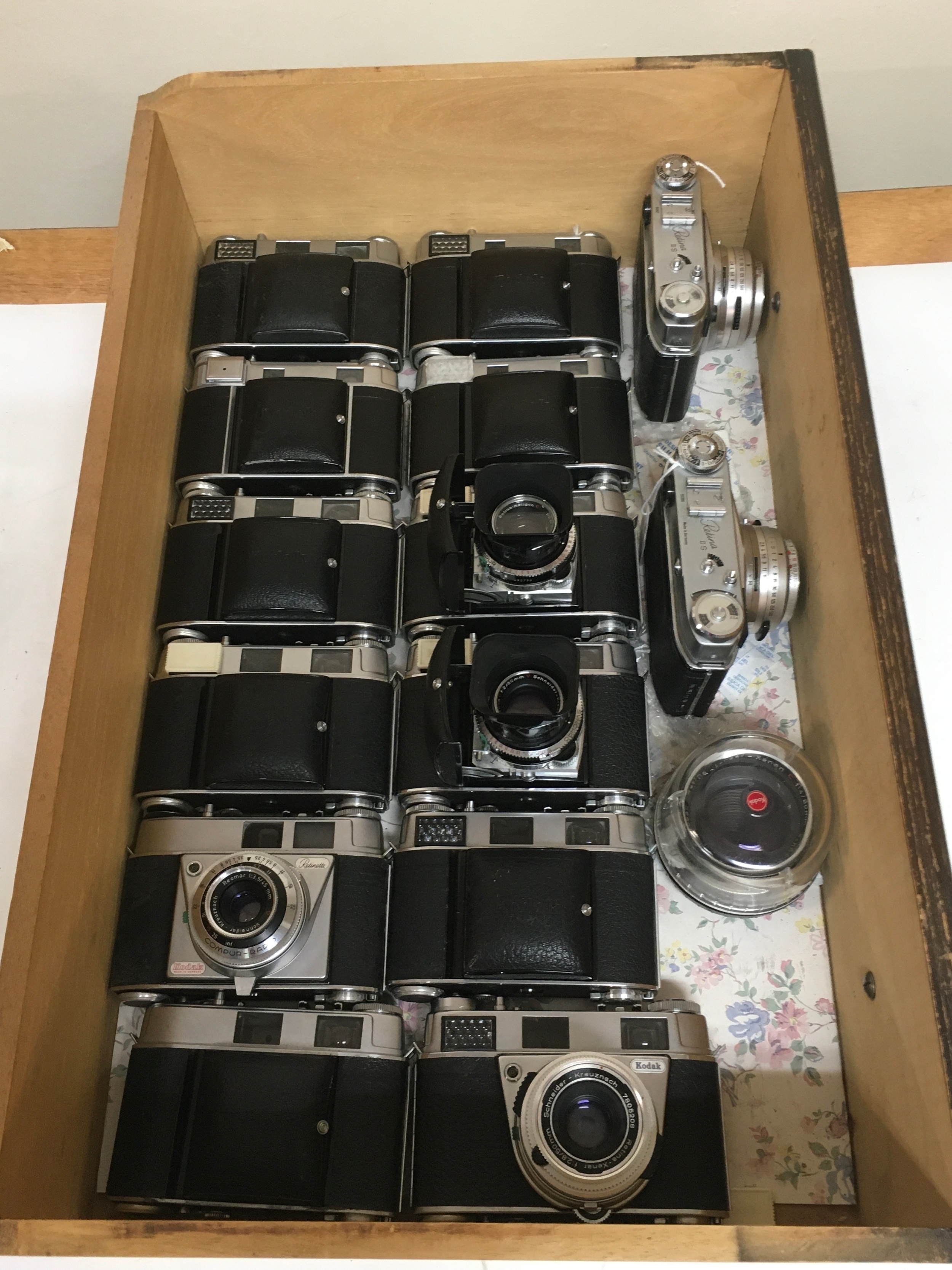 15 items. 9, Kodak Retina III C cameras. 1, Compur-Rapid, Retinette. 1, Retina, II C, 1, Retina III S.2, Retina II S. 1 additional Retina Camera lens.