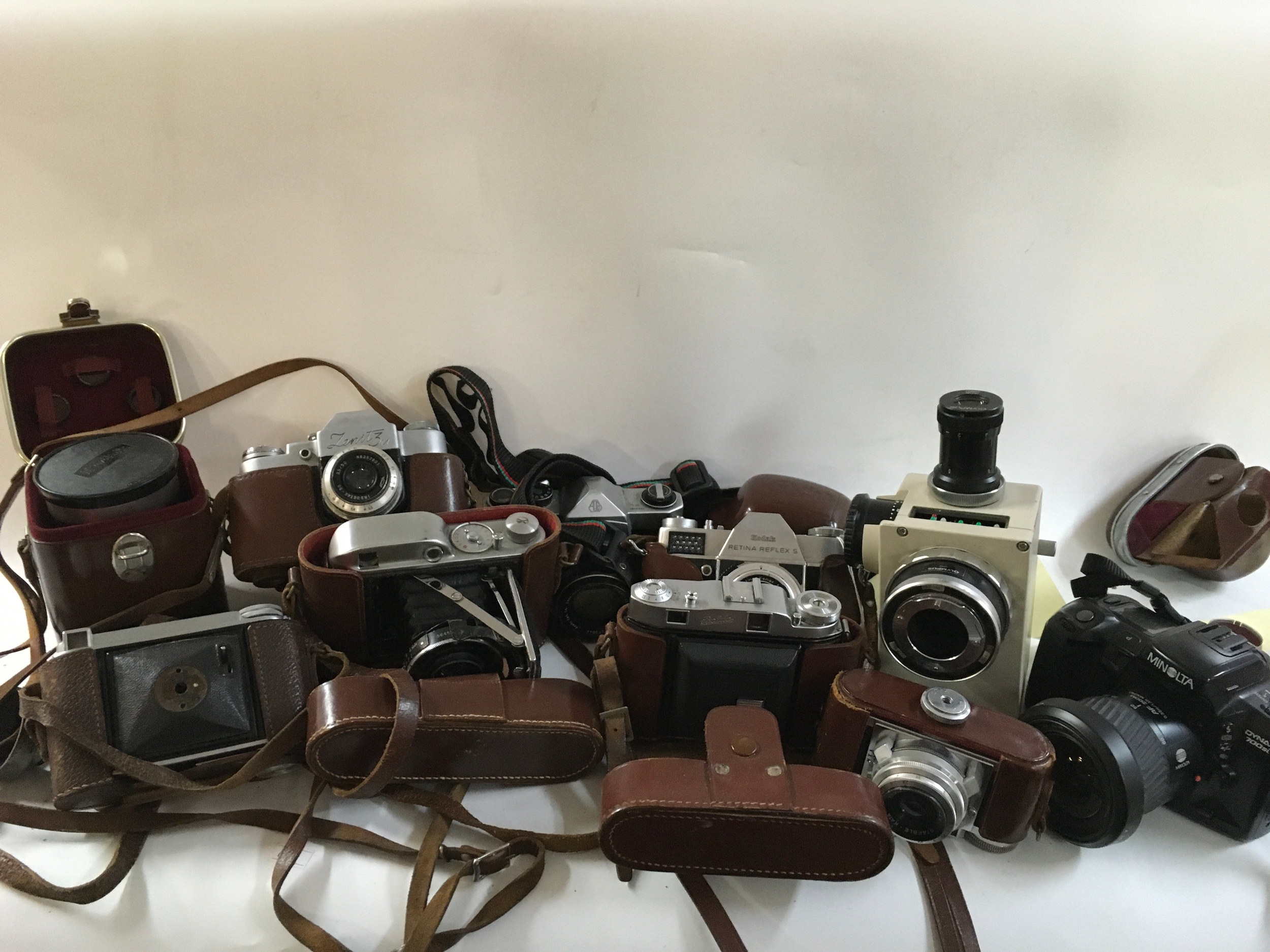 A varied group lot of vintage film cameras and accessories 