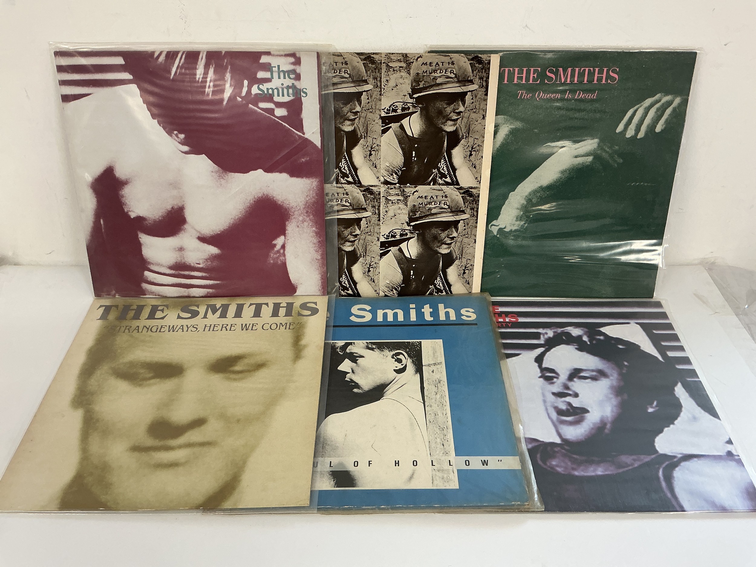 Six LPs by The Smiths comprising early UK pressings of their self titled debut, Meat Is Murder, The Queen Is Dead and others.