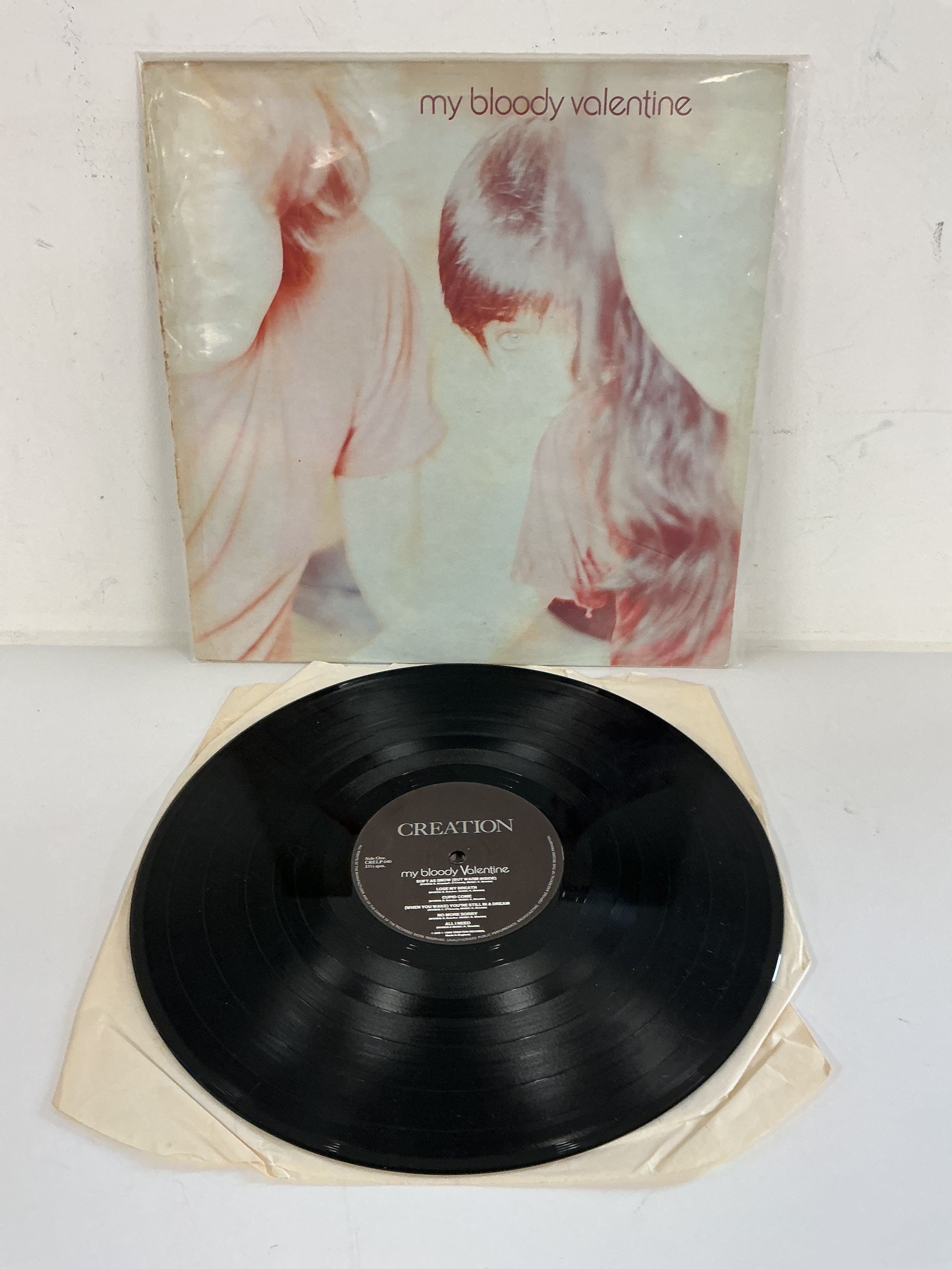 An early UK pressing of the My Bloody Valentine LP Isn't Anything. Vinyl EX.