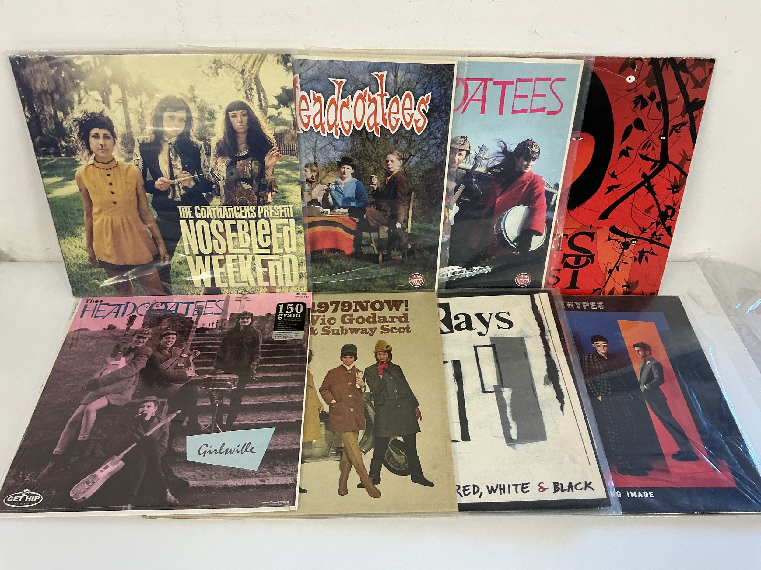 Eight indie alternative LPs by various artists including The Coathangers, Thee Headcoatees, The Strypes and others.