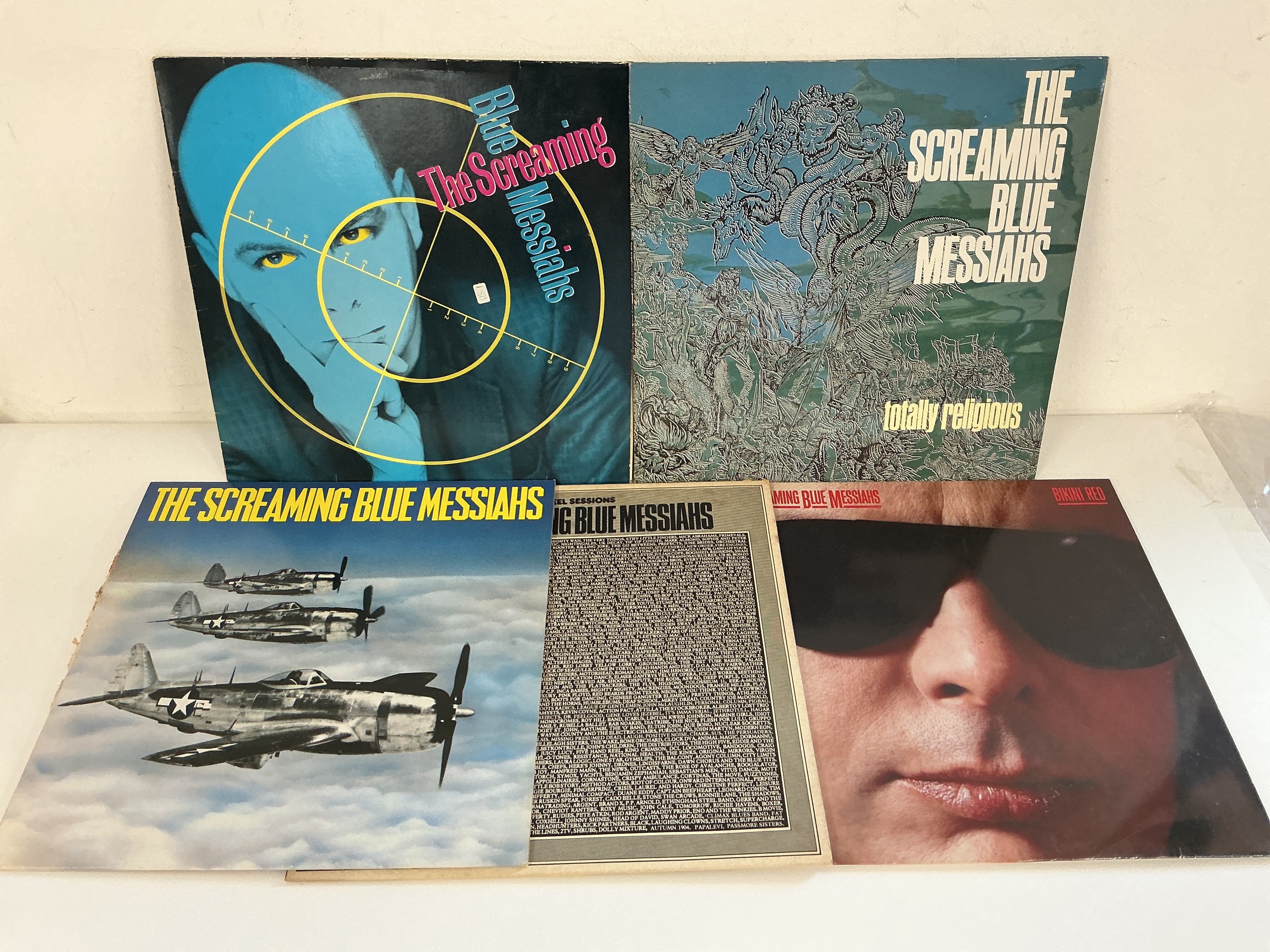 Five LPs by The Screaming Blue Messiahs comprising Bikini Red, Totally Religious and others.