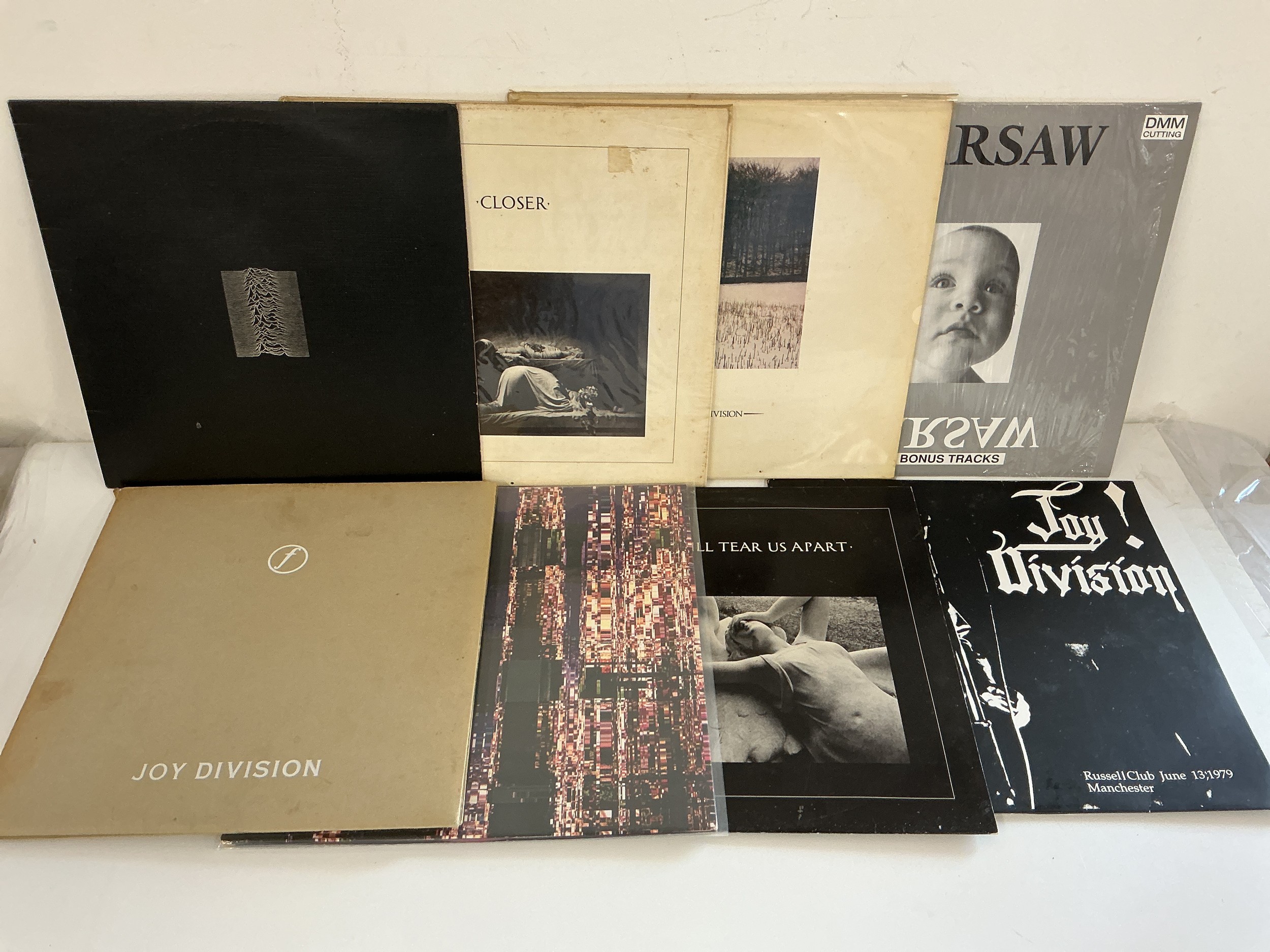 Eight Joy Division LPs and 12" singles including Unknown Pleasures, Closer, Still and others.