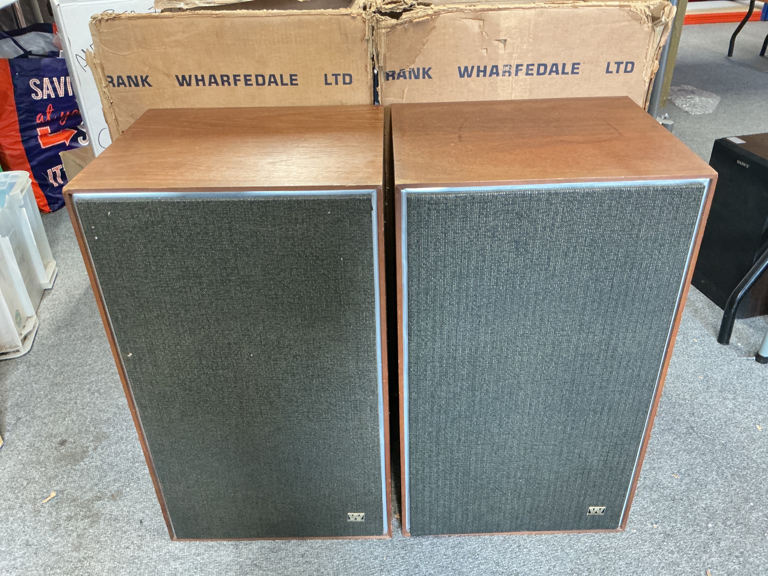A pair of boxed Wharfedale Dovedale III tower speakers.