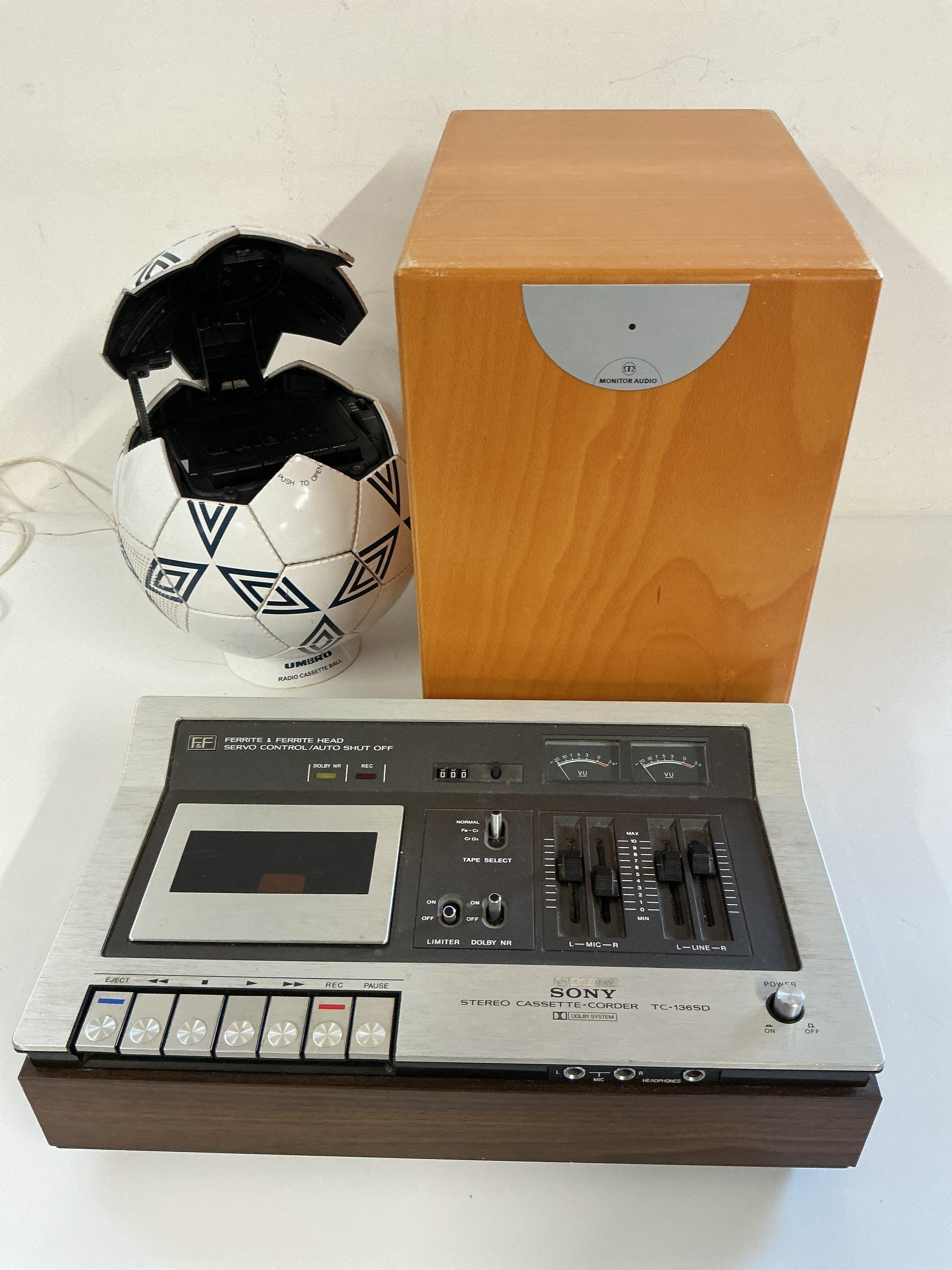 A Monitor Audio Radius 360 subwoofer, a Sony TC-136SD cassette corder and an Umbro novelty cassette player in the form of a football (3).