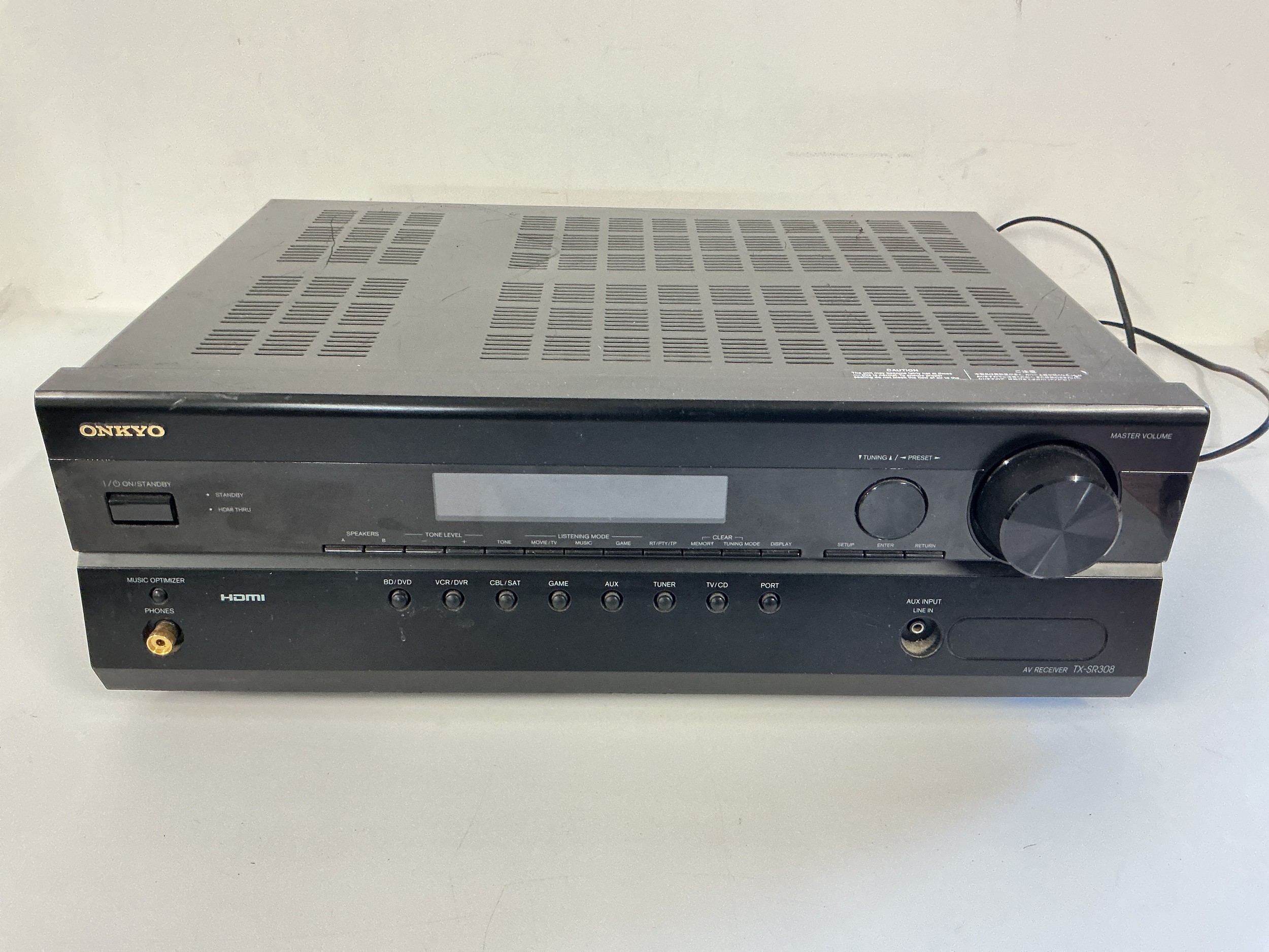 An Onkyo TX-SR308 AV receiver.
