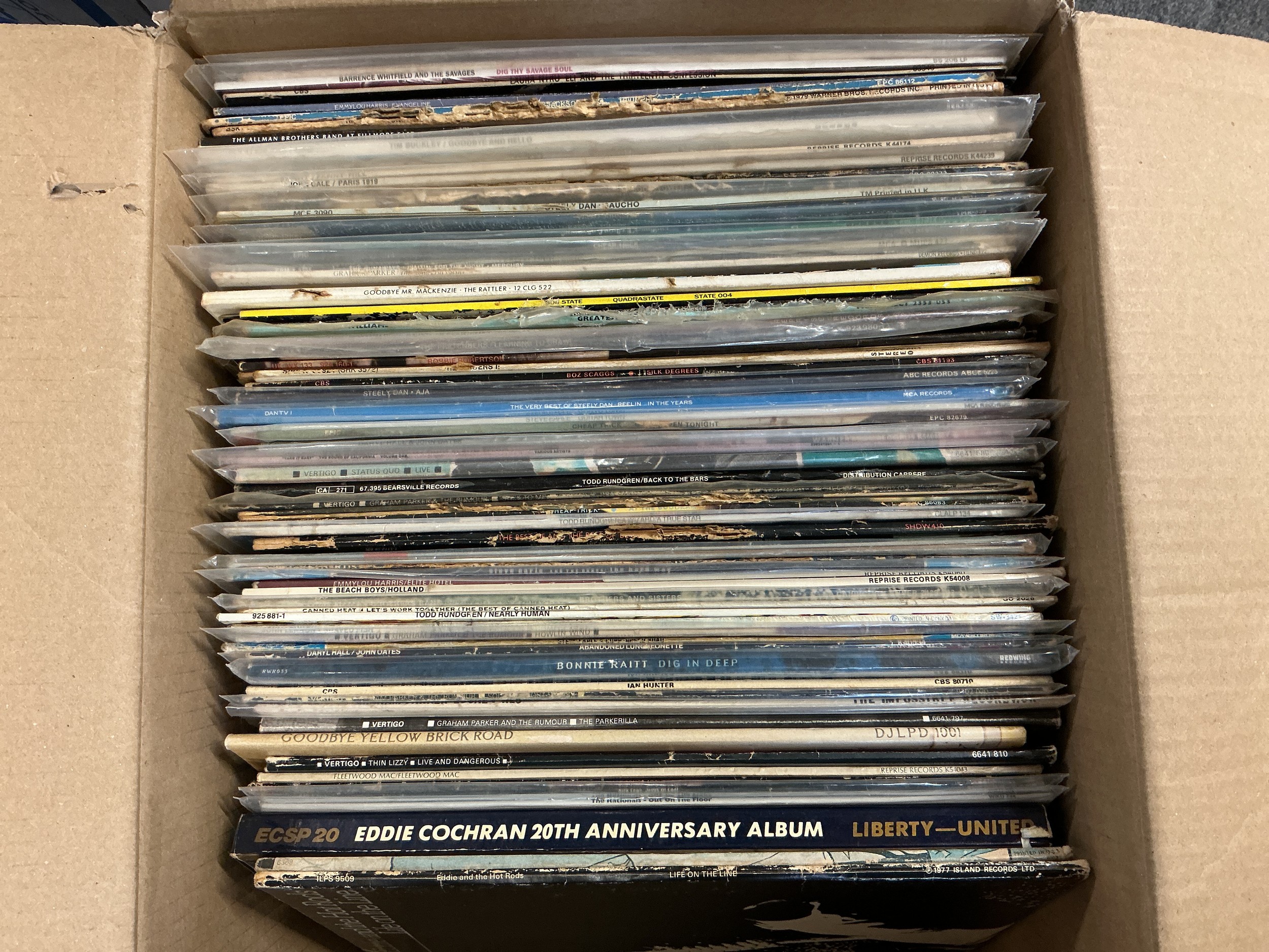 A collection of LPs by various artists including Thin Lizzy, Todd Rundgren, Graham Parker and many more.
